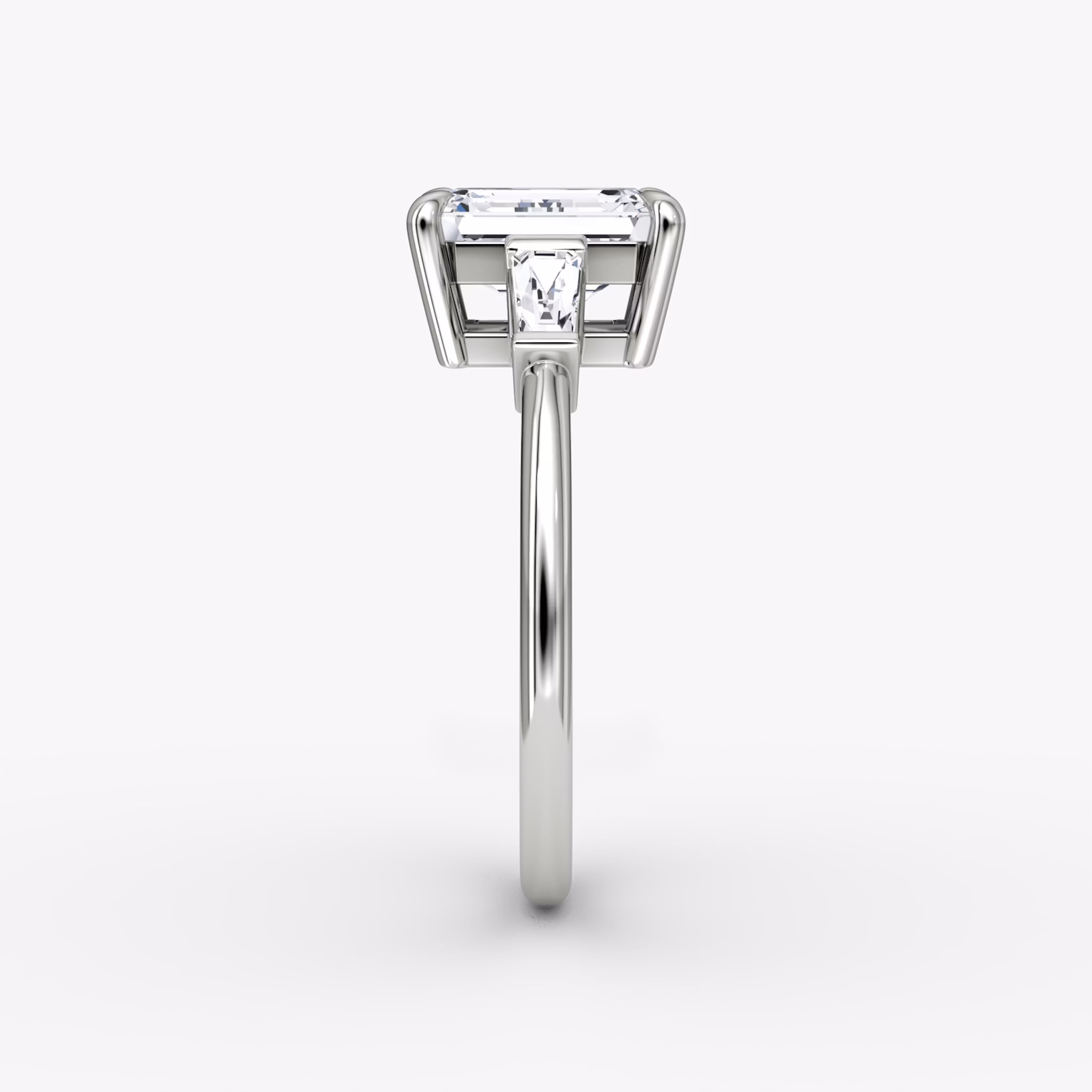 The Tapered Baguette Three Stone | Emerald | Platinum | bandAccent: Plain | excludeFromFeed: null | diamondOrientation: vertical | caratWeight: other
