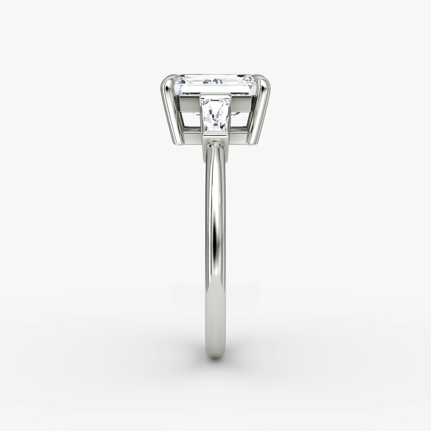 The Tapered Baguette Three Stone | Emerald | Platinum | bandAccent: Plain | excludeFromFeed: null | diamondOrientation: vertical | caratWeight: other