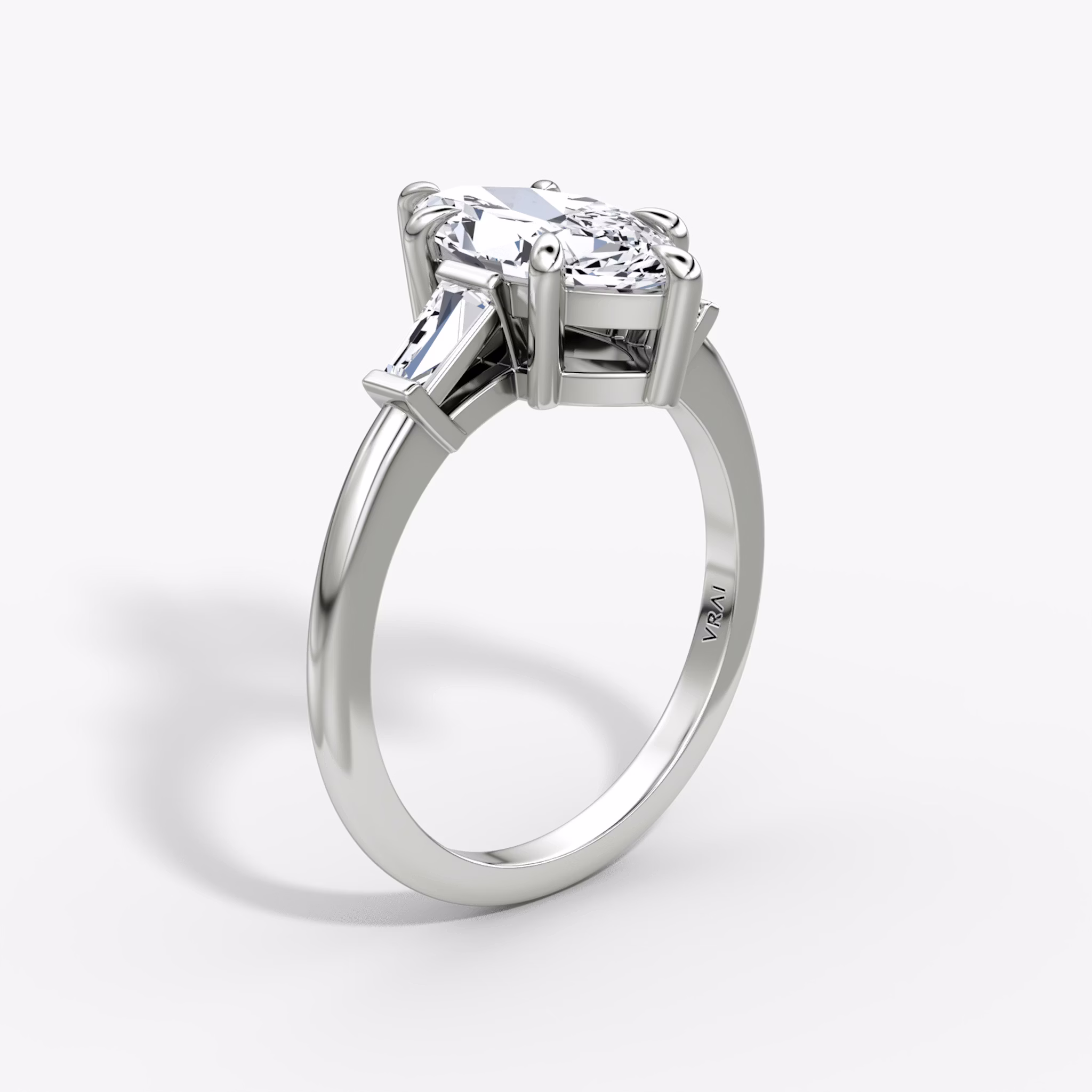 The Tapered Baguette Three Stone | Marquise | 18k | White Gold | bandAccent: Plain | excludeFromFeed: null | diamondOrientation: vertical | caratWeight: other