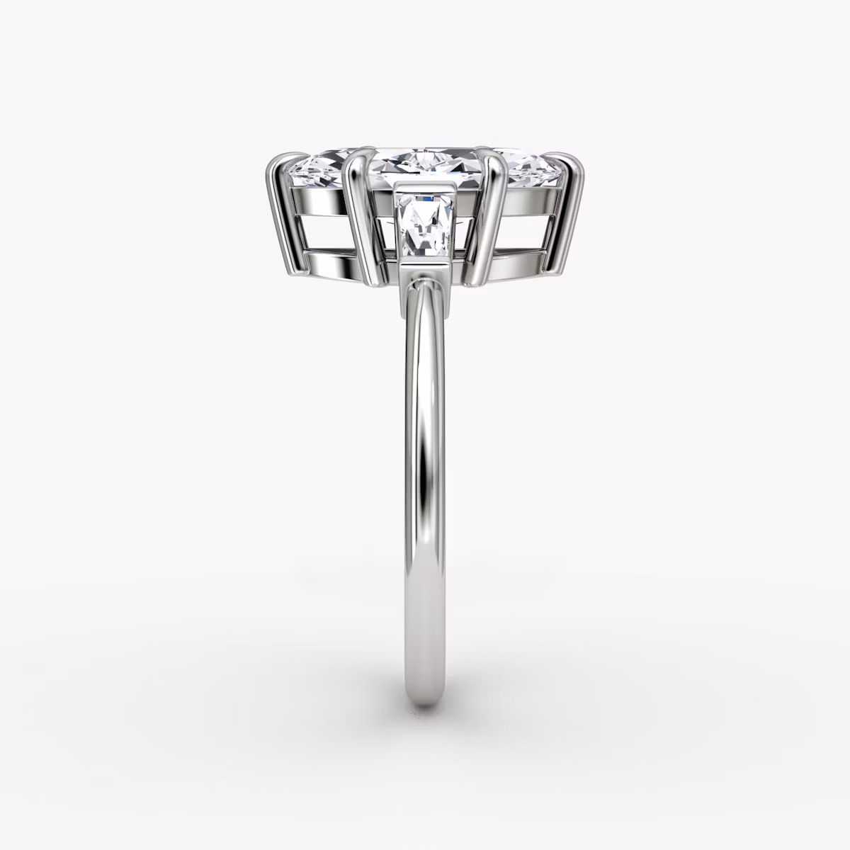 The Tapered Baguette Three Stone | Marquise | Platinum | bandAccent: Plain | caratWeight: 1.0ct | excludeFromFeed: null | diamondOrientation: vertical