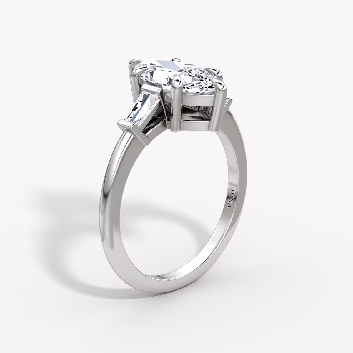 The Tapered Baguette Three Stone | Marquise | Platinum | bandAccent: Plain | caratWeight: 1.0ct | excludeFromFeed: null | diamondOrientation: vertical