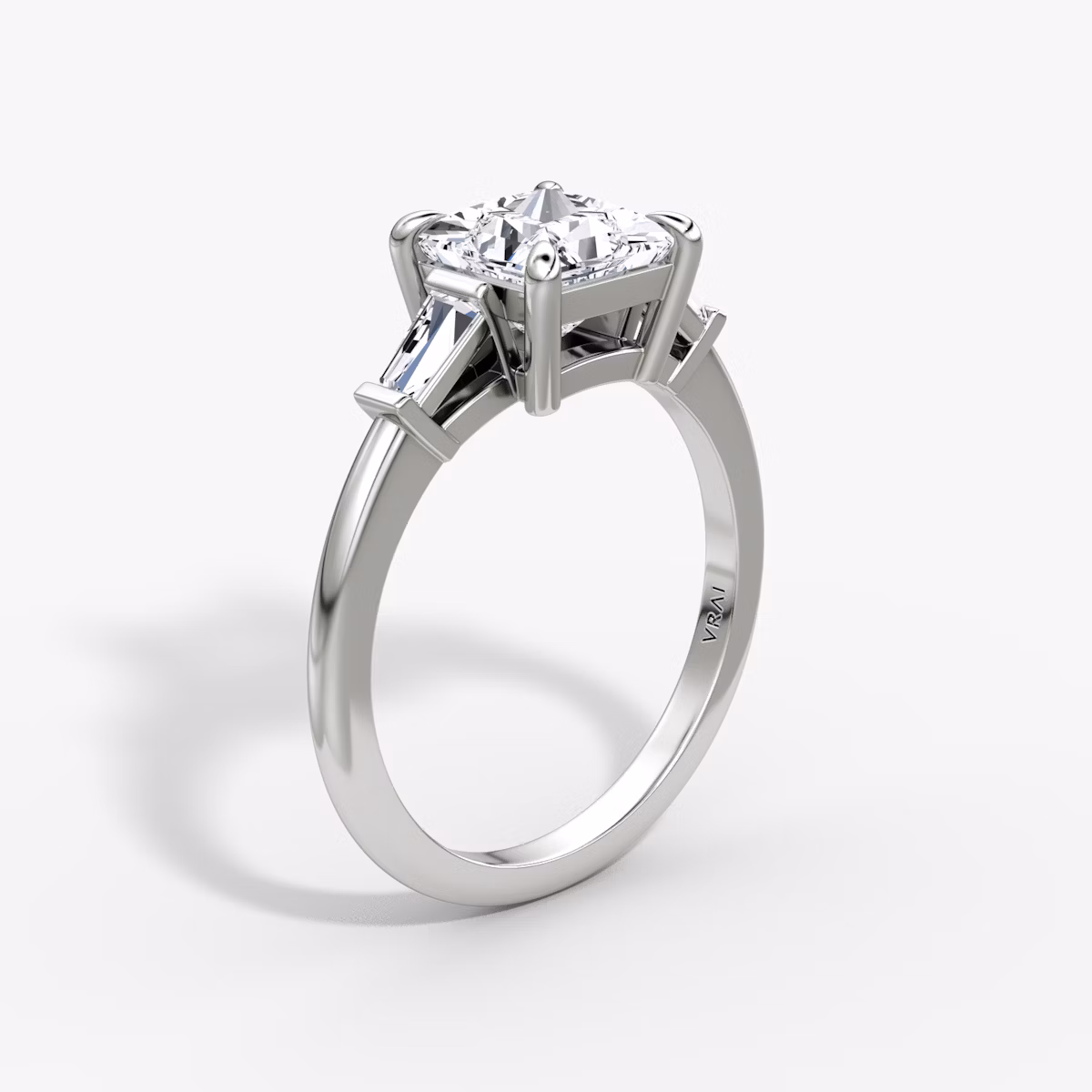 The Tapered Baguette Three Stone | Princess | 18k | White Gold | bandAccent: Plain | caratWeight: 1.0ct | excludeFromFeed: null | diamondOrientation: vertical