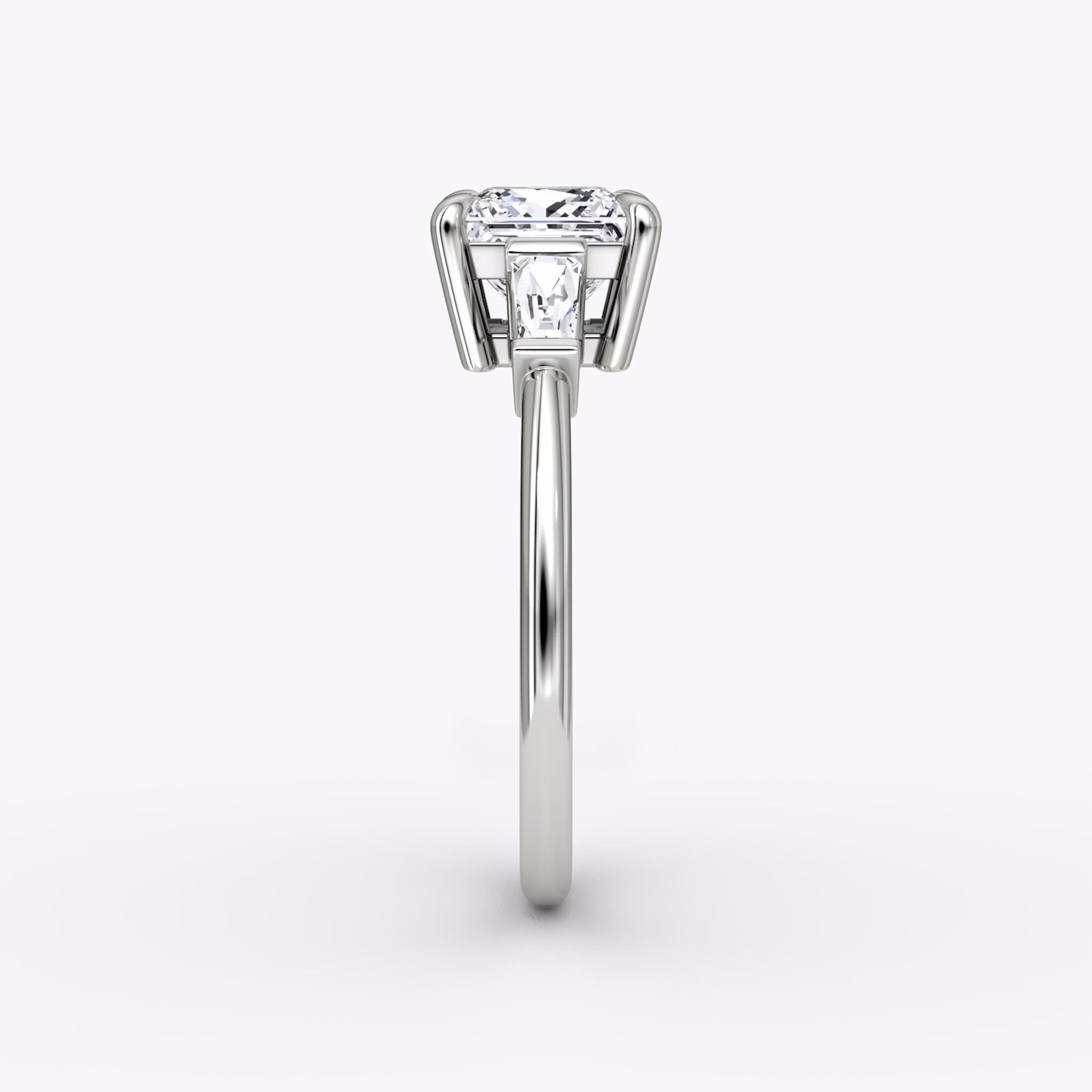 The Tapered Baguette Three Stone | Princess | Platinum | bandAccent: Plain | excludeFromFeed: null | diamondOrientation: vertical | caratWeight: other