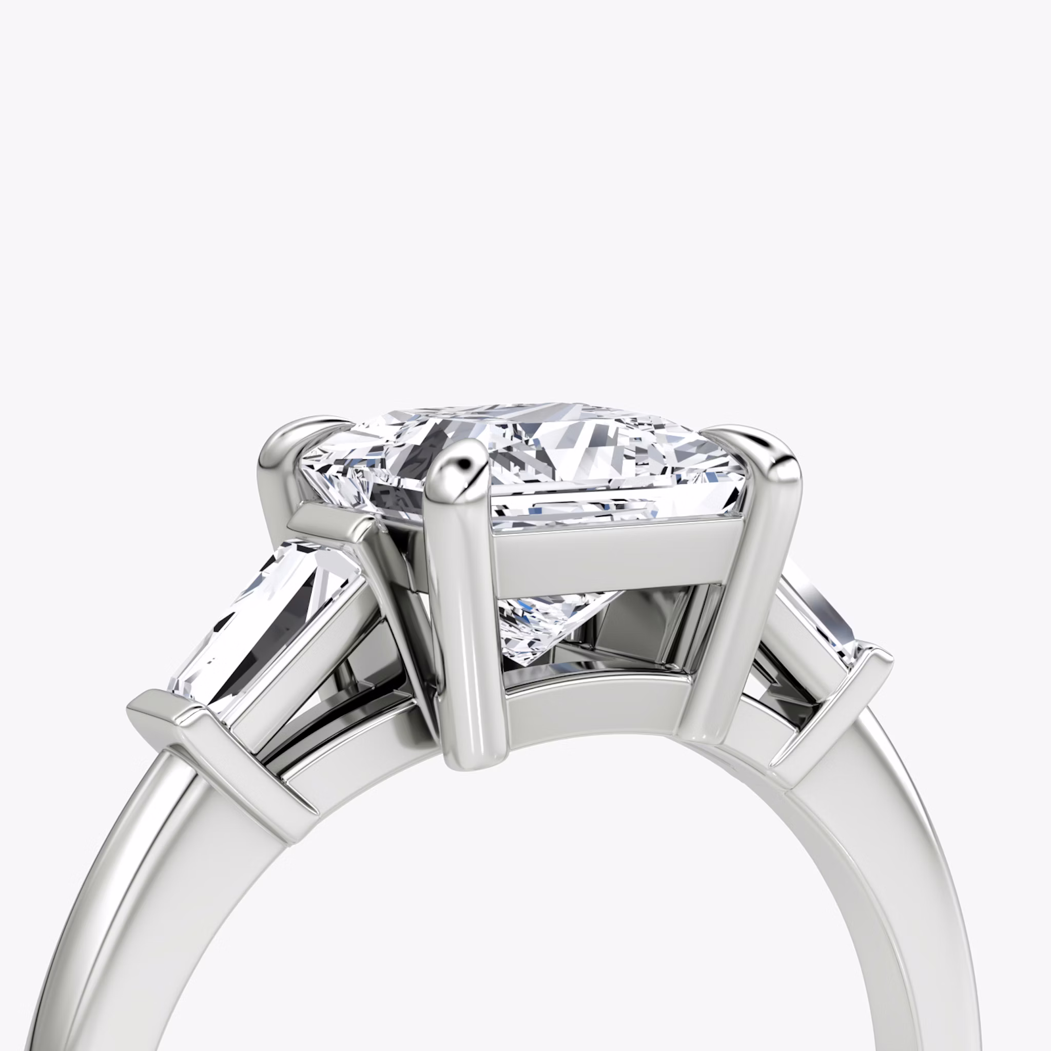 The Tapered Baguette Three Stone | Princess | Platinum | bandAccent: Plain | excludeFromFeed: null | diamondOrientation: vertical | caratWeight: other