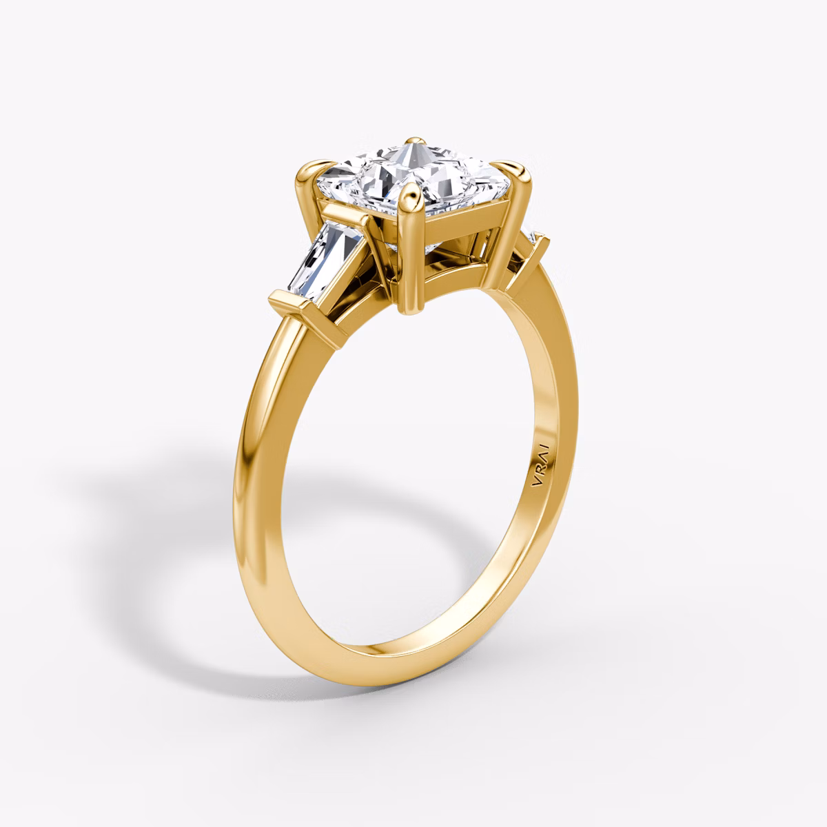 The Tapered Baguette Three Stone | Princess | 18k | Yellow Gold | bandAccent: Plain | caratWeight: 1.0ct | excludeFromFeed: null | diamondOrientation: vertical