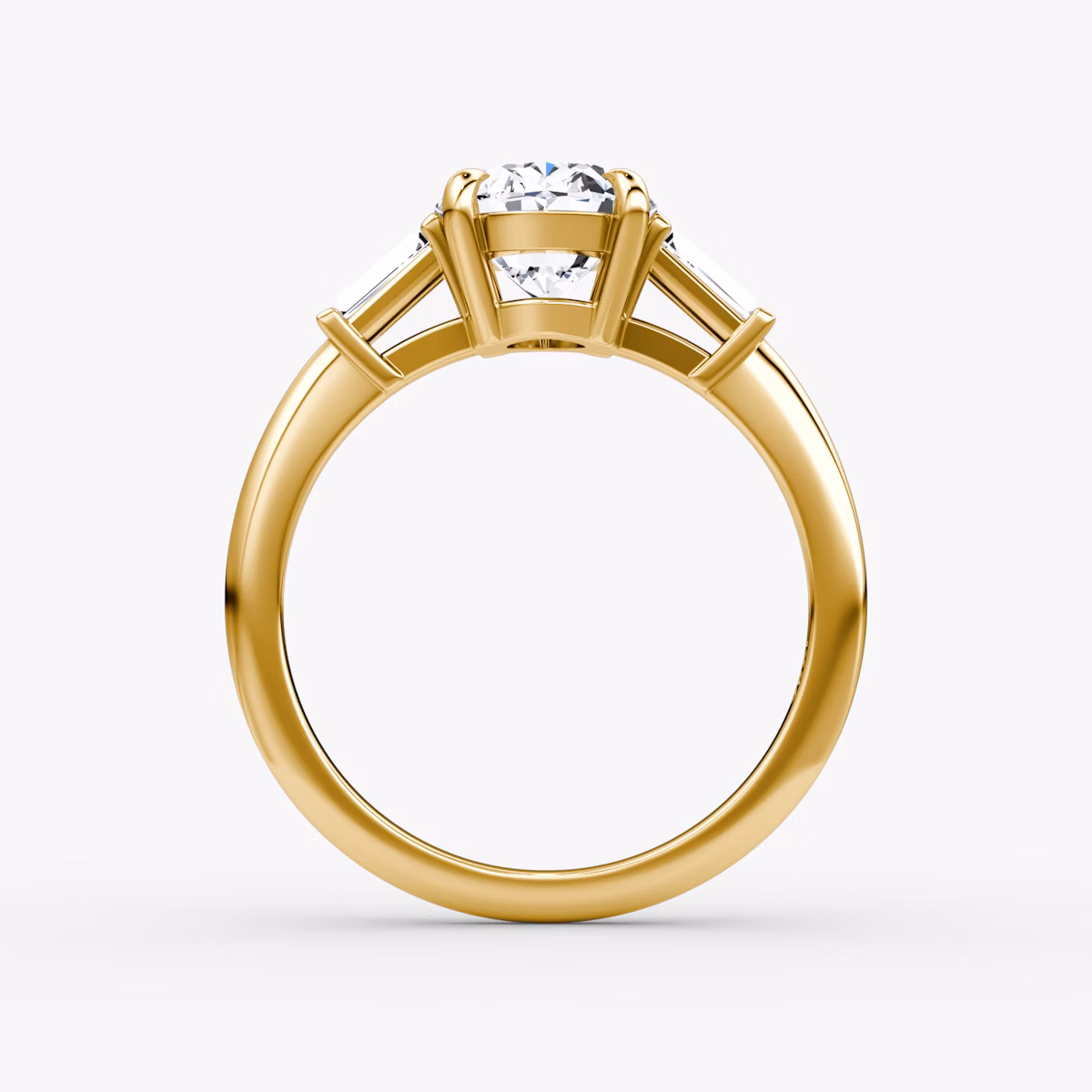 The Tapered Baguette Three Stone | Oval | 18k | Yellow Gold | bandAccent: Plain | caratWeight: 1.0ct | excludeFromFeed: null | diamondOrientation: vertical
