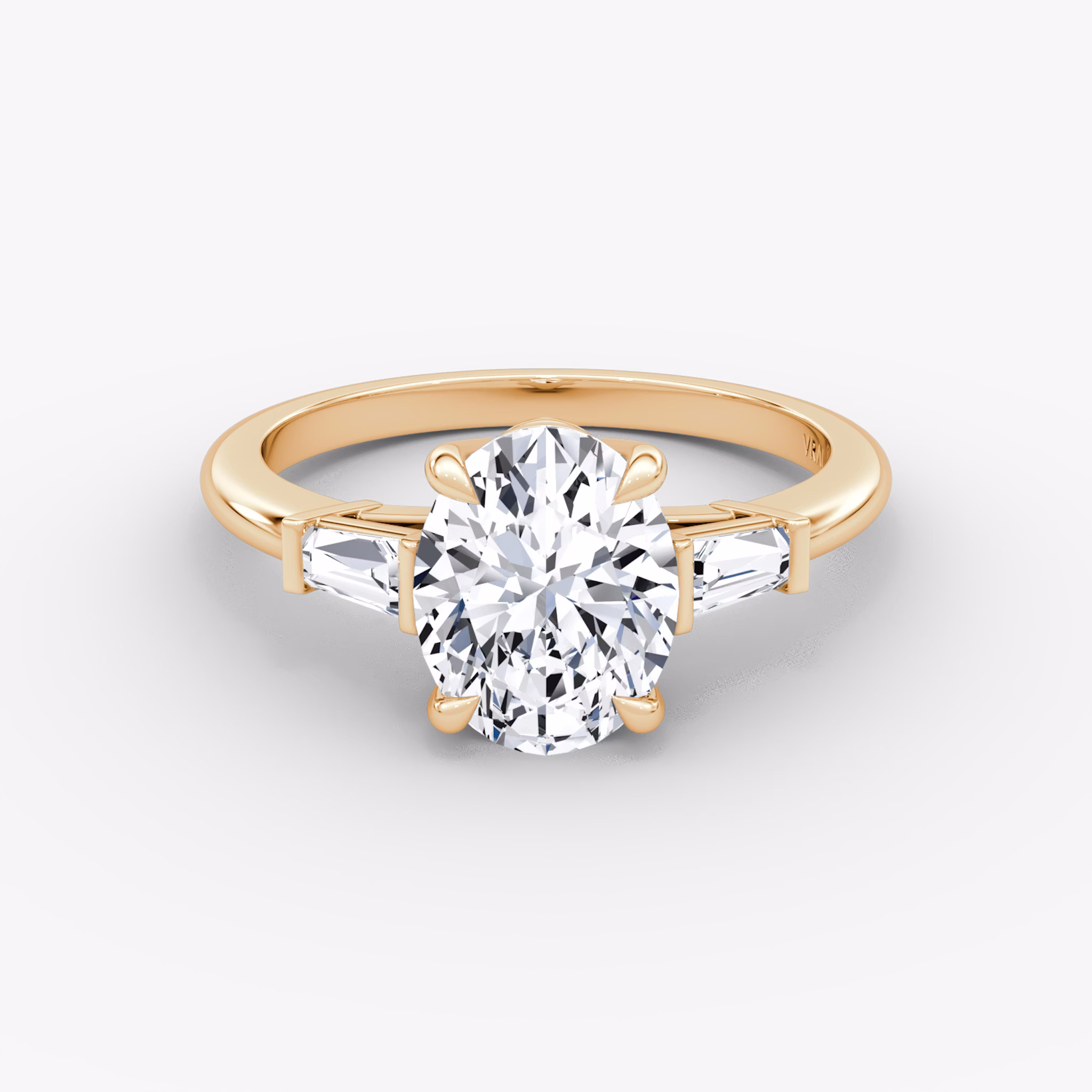 The Tapered Baguette Three Stone | Oval | 14k | Rose Gold | bandAccent: Plain | excludeFromFeed: null | diamondOrientation: vertical | caratWeight: other