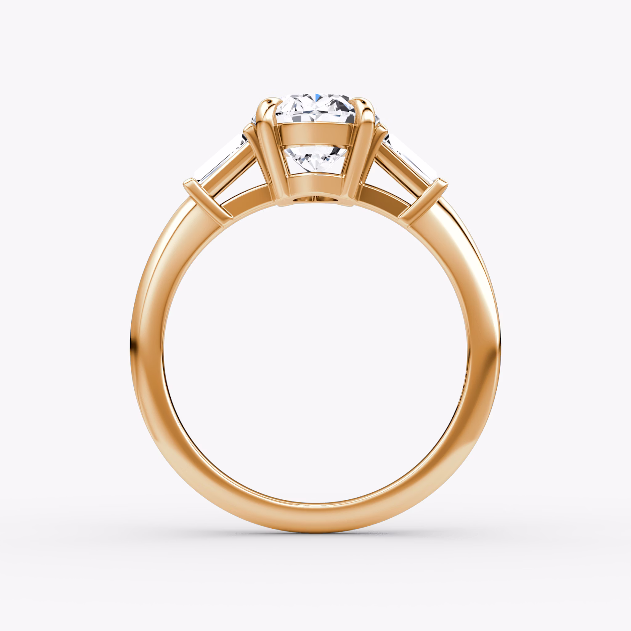 The Tapered Baguette Three Stone | Oval | 14k | Rose Gold | bandAccent: Plain | excludeFromFeed: null | diamondOrientation: vertical | caratWeight: other
