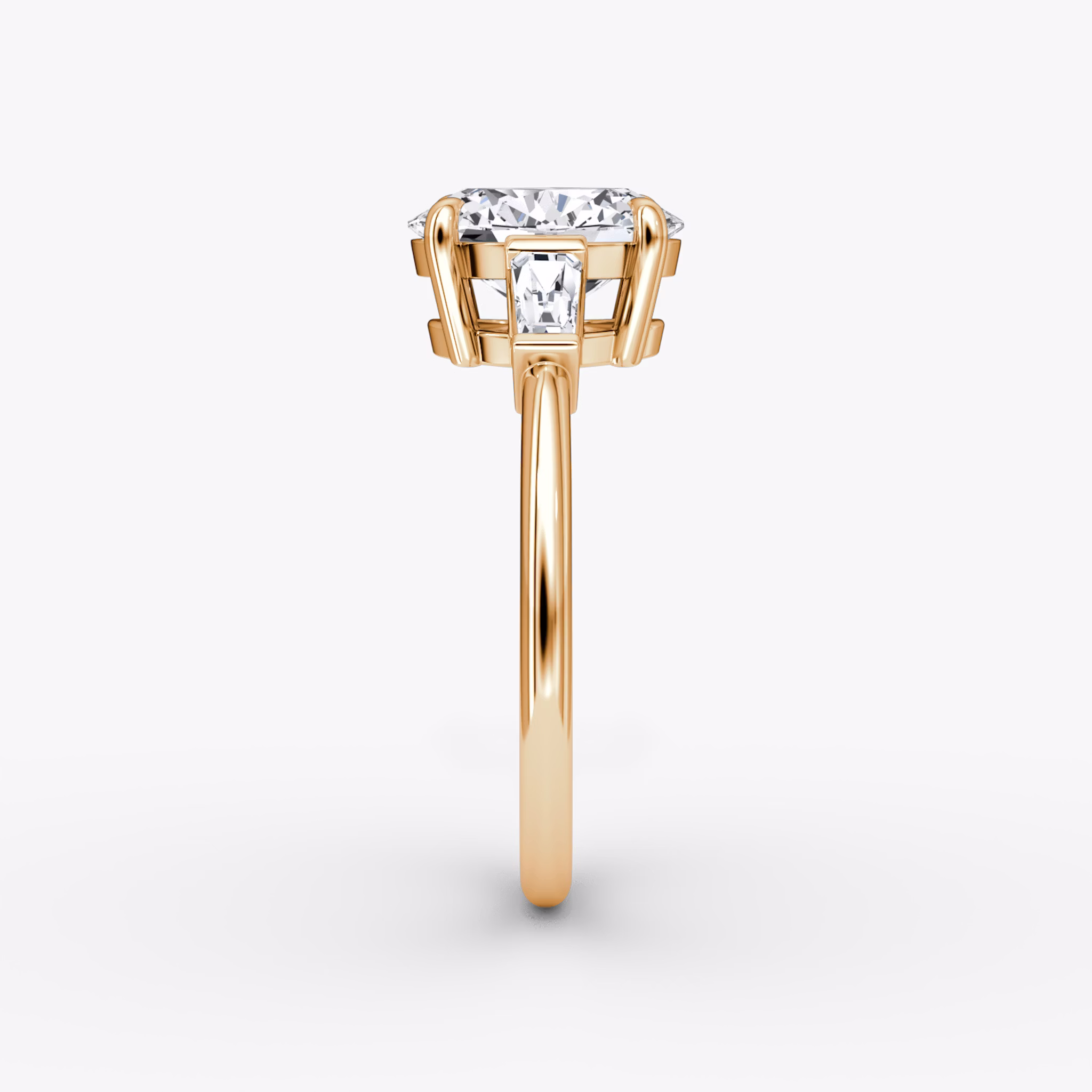 The Tapered Baguette Three Stone | Oval | 14k | Rose Gold | bandAccent: Plain | excludeFromFeed: null | diamondOrientation: vertical | caratWeight: other