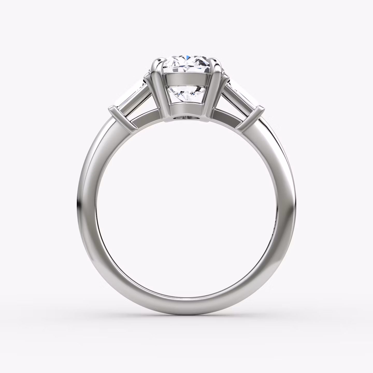 The Tapered Baguette Three Stone | Oval | Platinum | bandAccent: Plain | excludeFromFeed: null | diamondOrientation: vertical | caratWeight: other