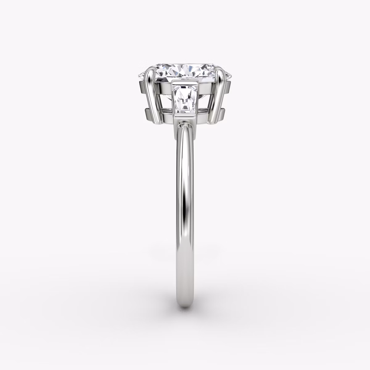 The Tapered Baguette Three Stone | Oval | Platinum | bandAccent: Plain | caratWeight: 1.0ct | excludeFromFeed: null | diamondOrientation: vertical