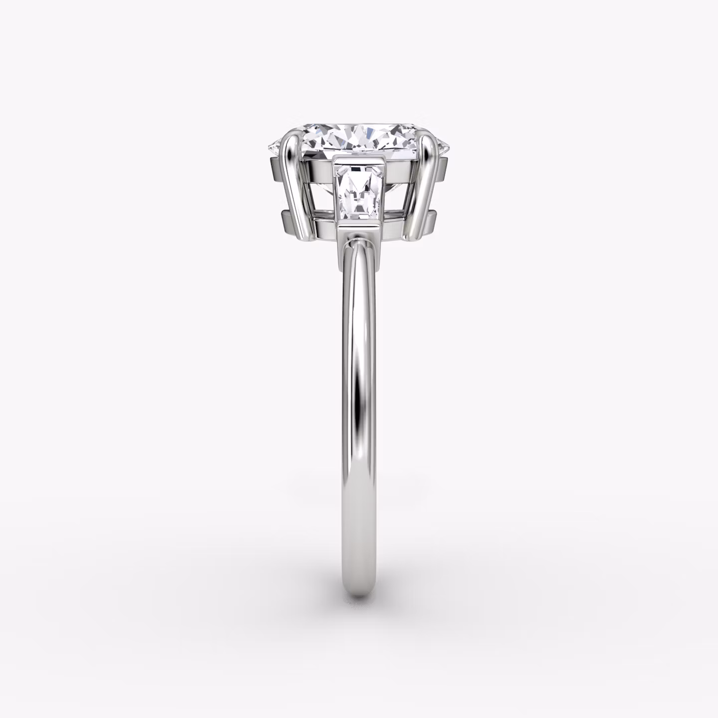 The Tapered Baguette Three Stone | Oval | Platinum | bandAccent: Plain | excludeFromFeed: null | diamondOrientation: vertical | caratWeight: other