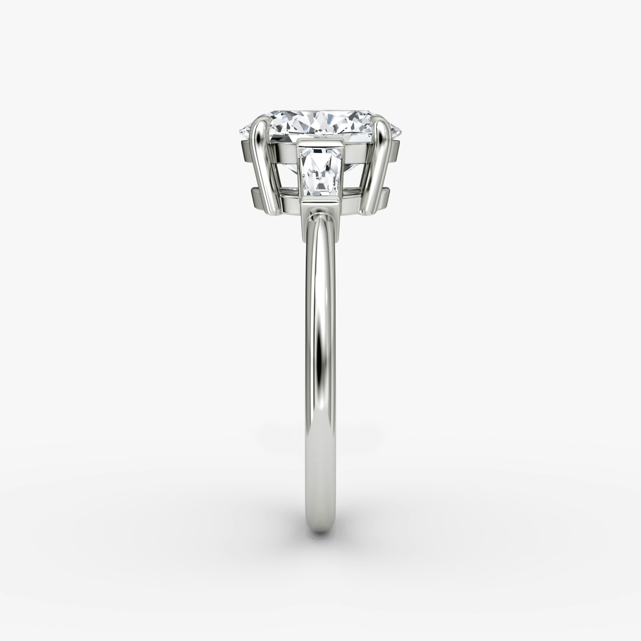 The Tapered Baguette Three Stone | Oval | Platinum | bandAccent: Plain | excludeFromFeed: null | diamondOrientation: vertical | caratWeight: other