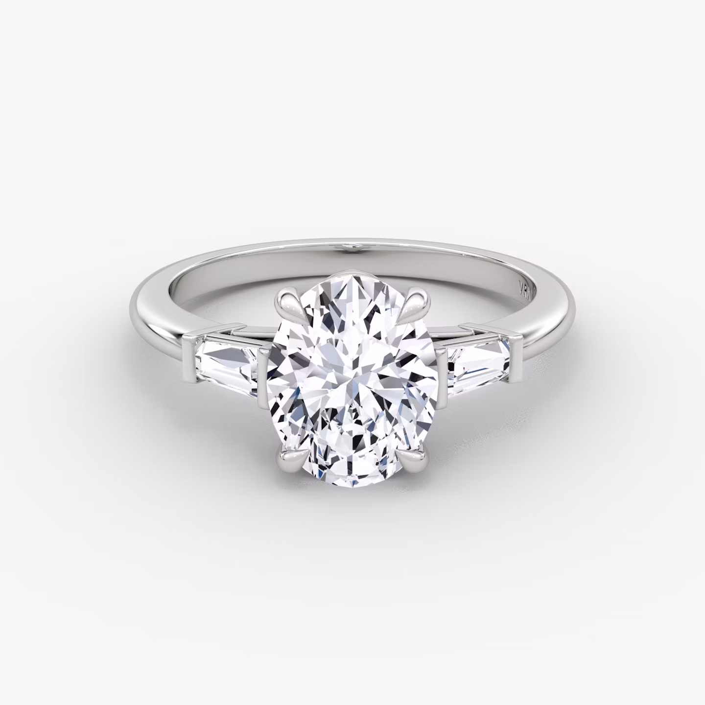 The Tapered Baguette Three Stone | Oval | 18k | White Gold | bandAccent: Plain | excludeFromFeed: null | diamondOrientation: vertical | caratWeight: other