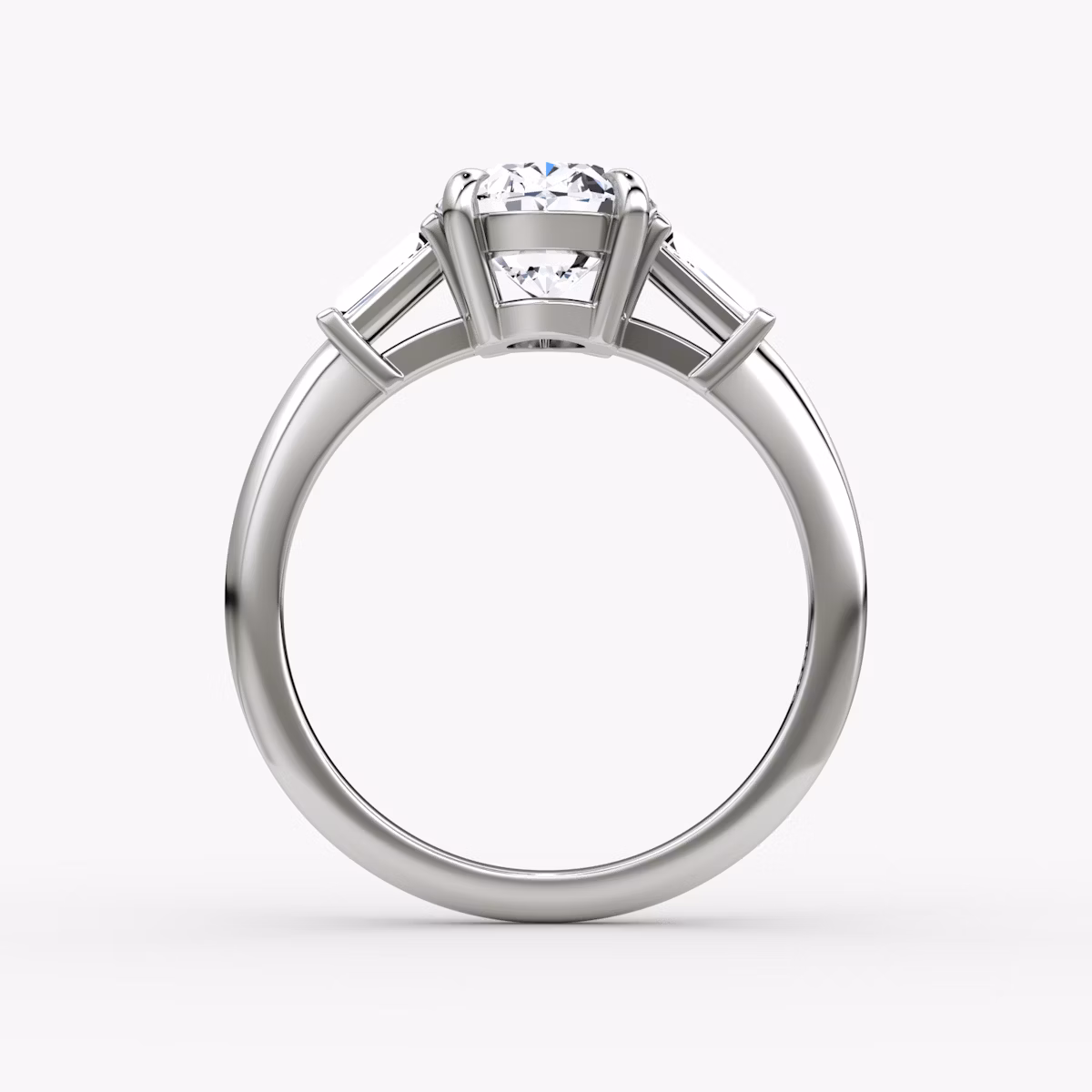 The Tapered Baguette Three Stone | Oval | 18k | White Gold | bandAccent: Plain | caratWeight: 1.0ct | excludeFromFeed: null | diamondOrientation: vertical