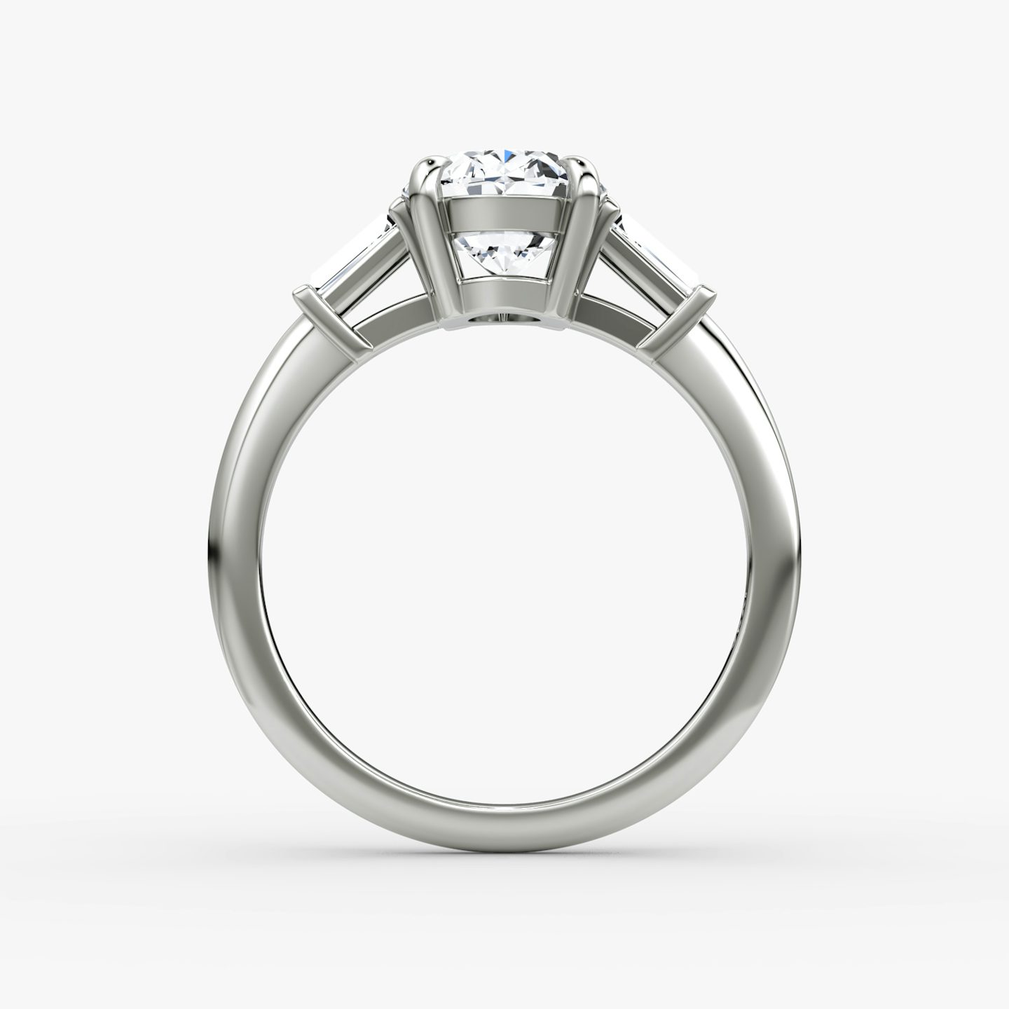 The Tapered Baguette Three Stone | Oval | 18k | White Gold | bandAccent: Plain | excludeFromFeed: null | diamondOrientation: vertical | caratWeight: other