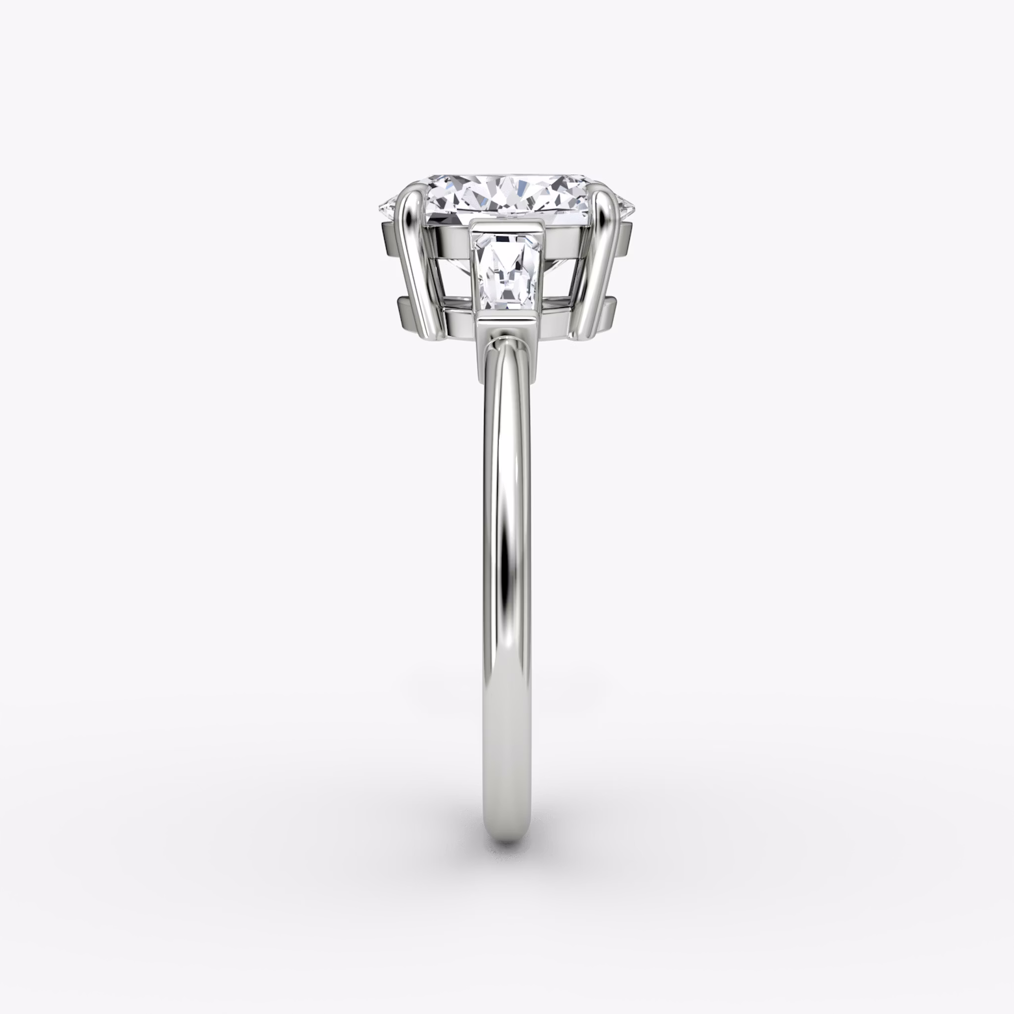 The Tapered Baguette Three Stone | Oval | 18k | White Gold | bandAccent: Plain | excludeFromFeed: null | diamondOrientation: vertical | caratWeight: other