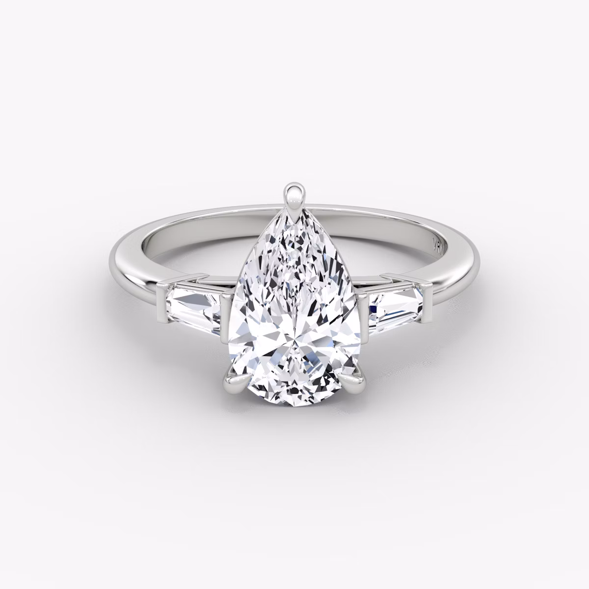 The Tapered Baguette Three Stone | Pear | Platinum | bandAccent: Plain | caratWeight: 1.0ct | excludeFromFeed: null | diamondOrientation: vertical