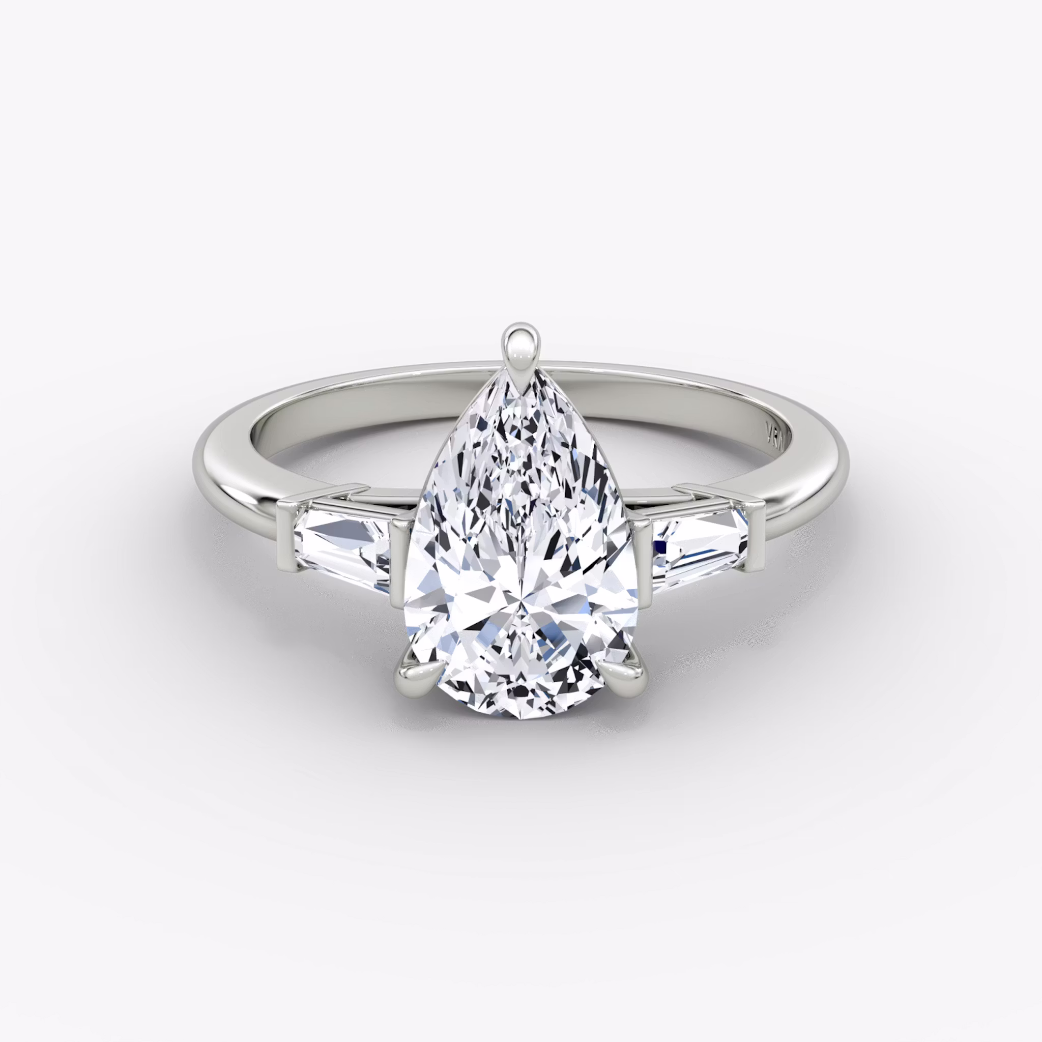 The Tapered Baguette Three Stone Pear | Platinum