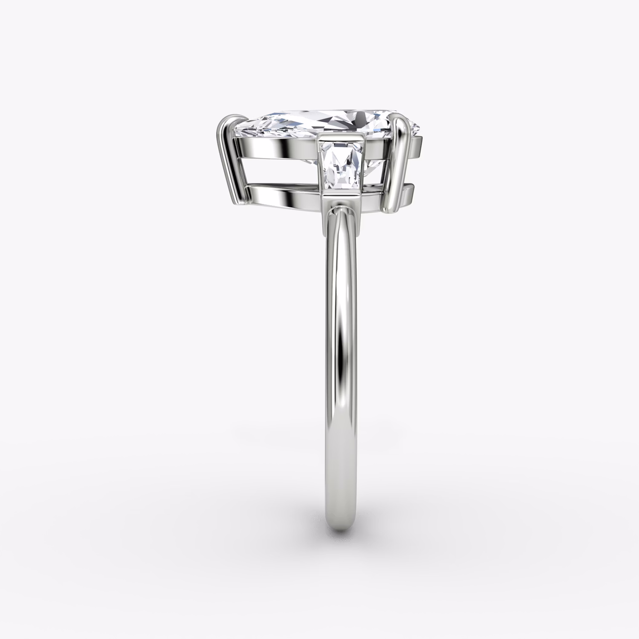 The Tapered Baguette Three Stone | Pear | 18k | White Gold | bandAccent: Plain | excludeFromFeed: null | diamondOrientation: vertical | caratWeight: other