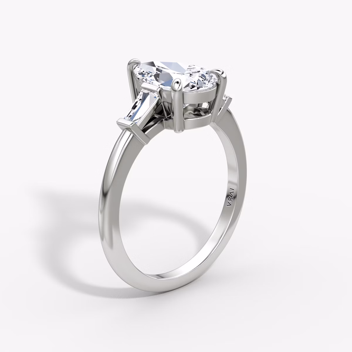The Tapered Baguette Three Stone | Pear | 18k | White Gold | bandAccent: Plain | caratWeight: 1.0ct | excludeFromFeed: null | diamondOrientation: vertical