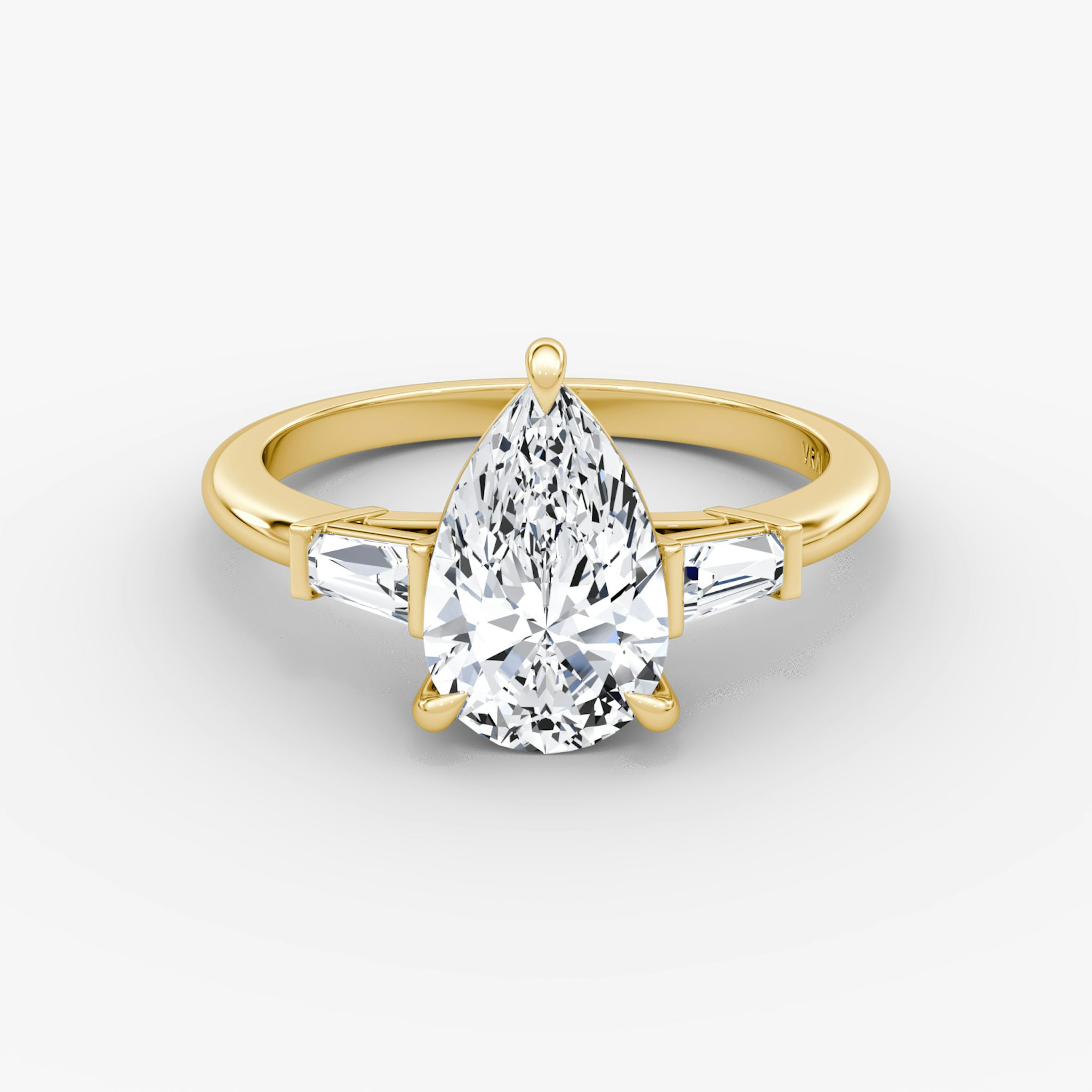 The Tapered Baguette Three Stone | Pear | 18k | Yellow Gold | bandAccent: Plain | excludeFromFeed: null | diamondOrientation: vertical | caratWeight: other