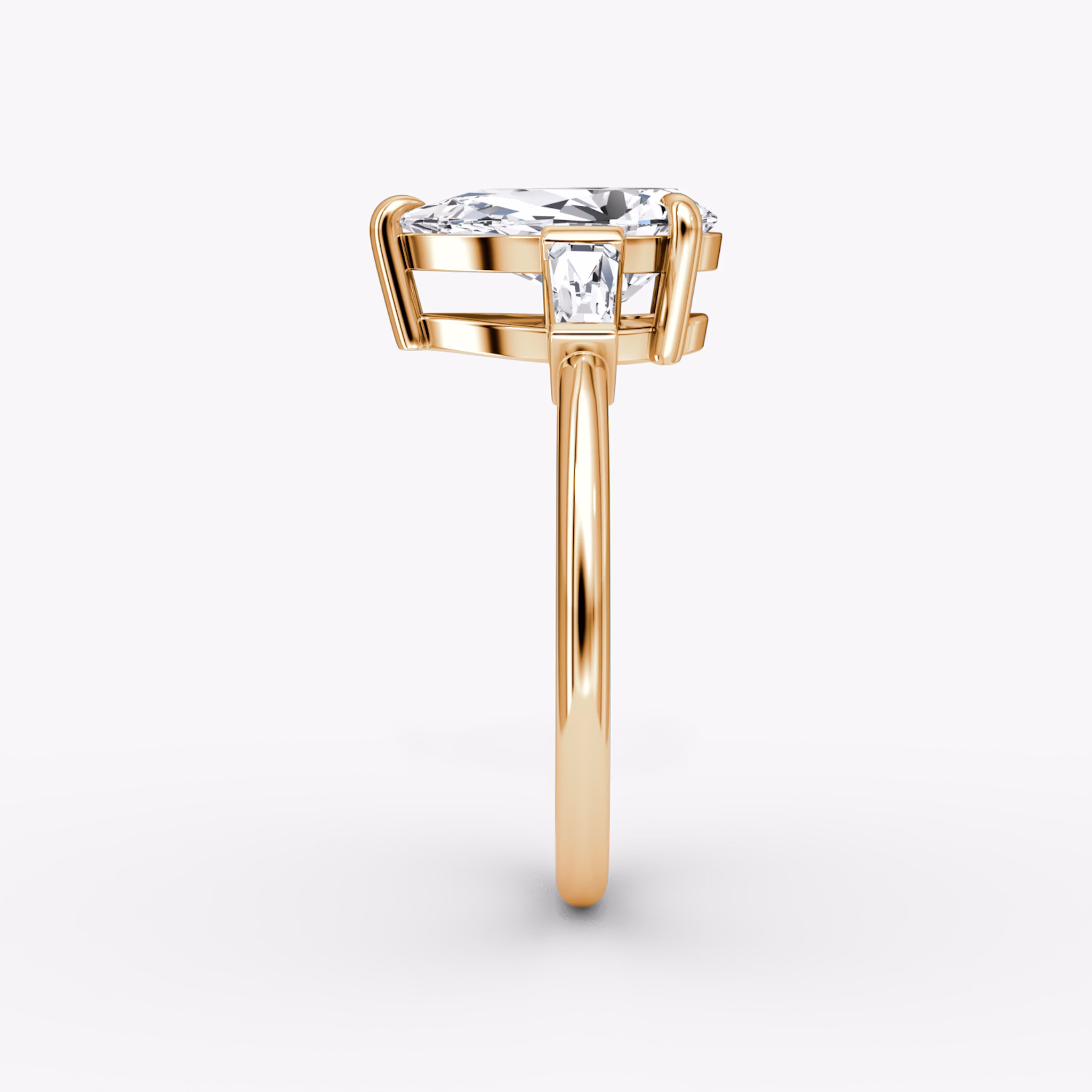 The Tapered Baguette Three Stone | Pear | 14k | Rose Gold | bandAccent: Plain | excludeFromFeed: null | diamondOrientation: vertical | caratWeight: other