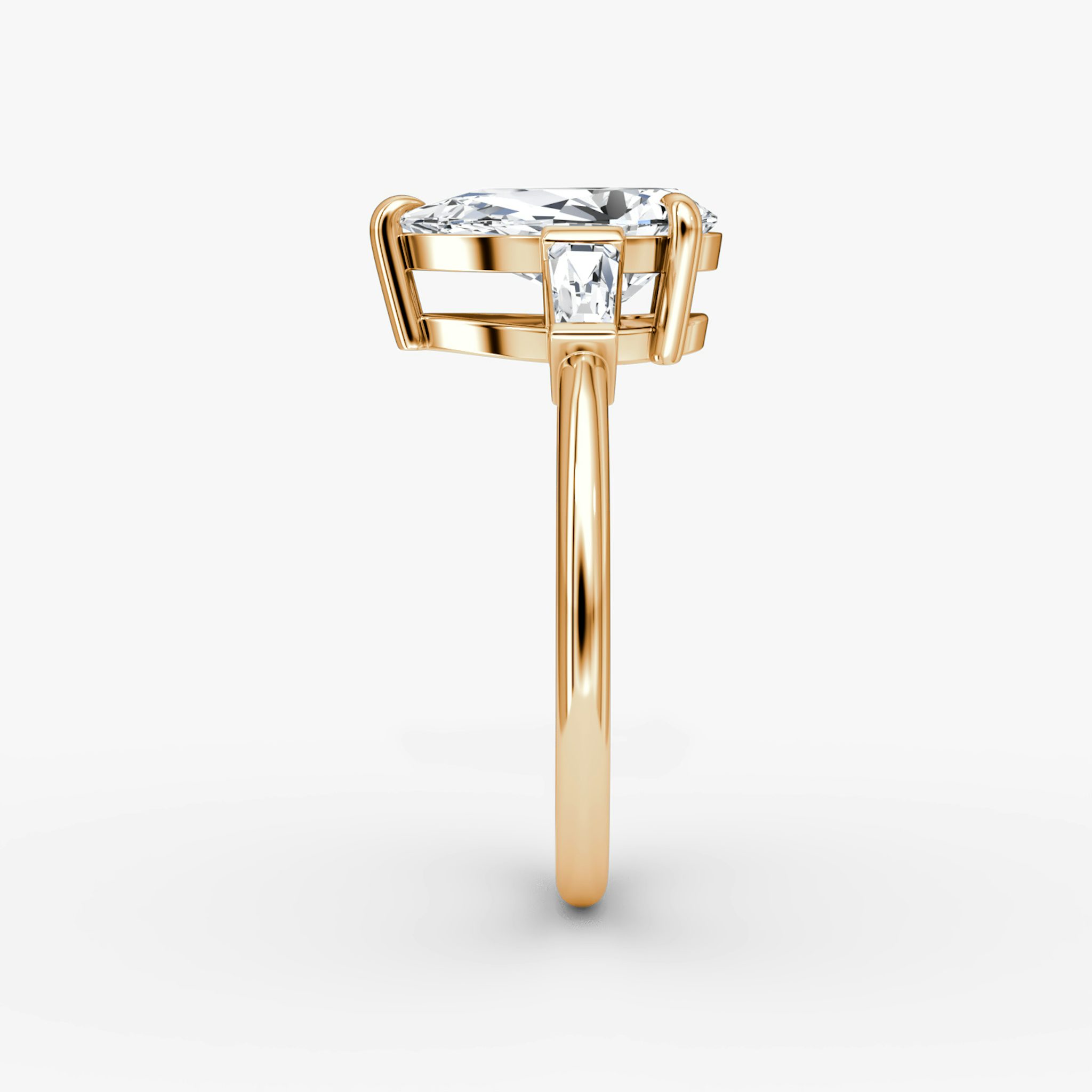 The Tapered Baguette Three Stone | Pear | 14k | Rose Gold | bandAccent: Plain | excludeFromFeed: null | diamondOrientation: vertical | caratWeight: other