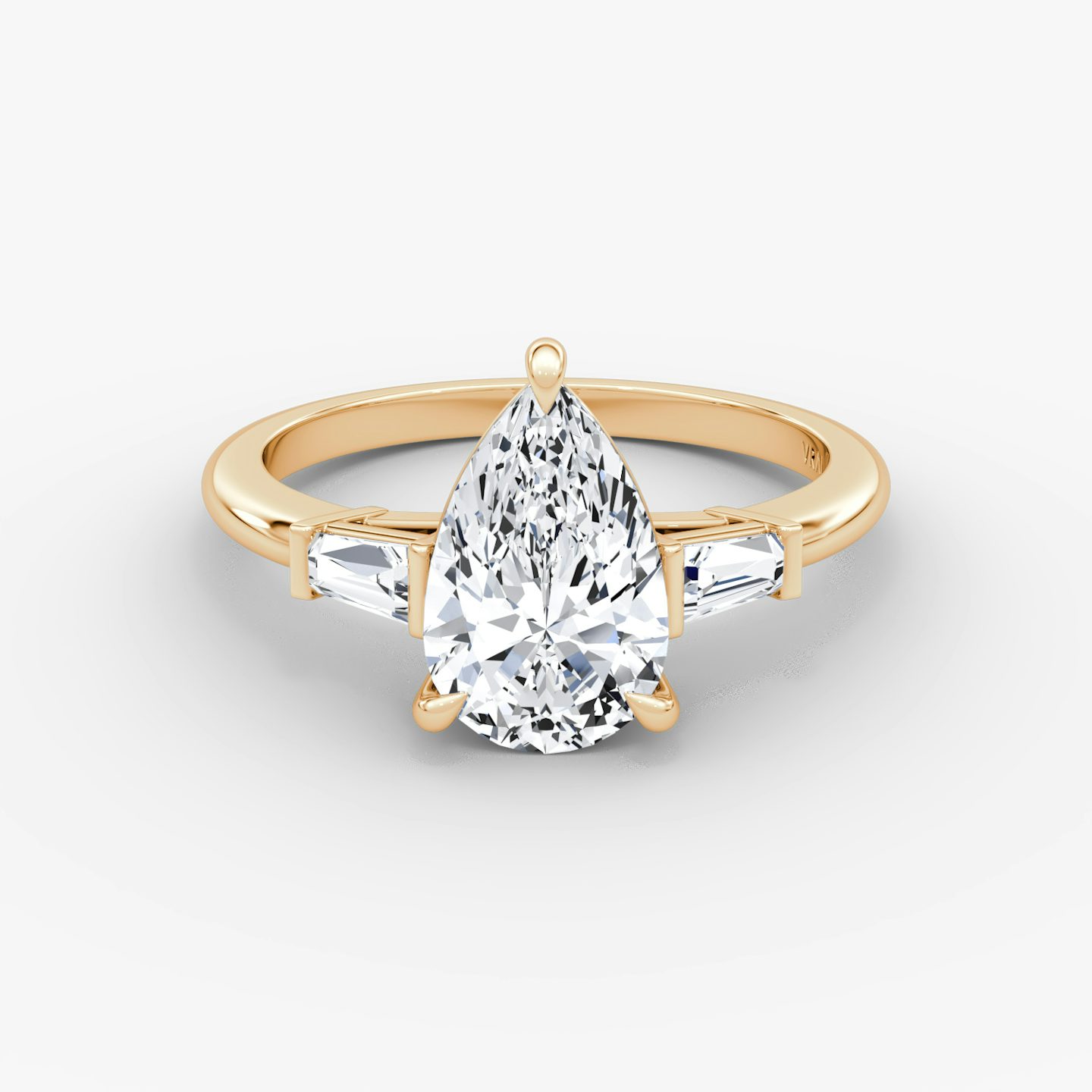 The Tapered Baguette Three Stone | Pear | 14k | Rose Gold | bandAccent: Plain | excludeFromFeed: null | diamondOrientation: vertical | caratWeight: other