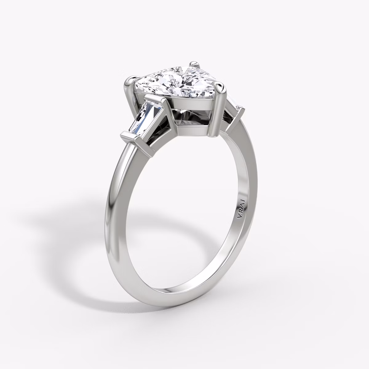 The Tapered Baguette Three Stone | Trillion | 18k | White Gold | bandAccent: Plain | caratWeight: 1.0ct | excludeFromFeed: null | diamondOrientation: vertical