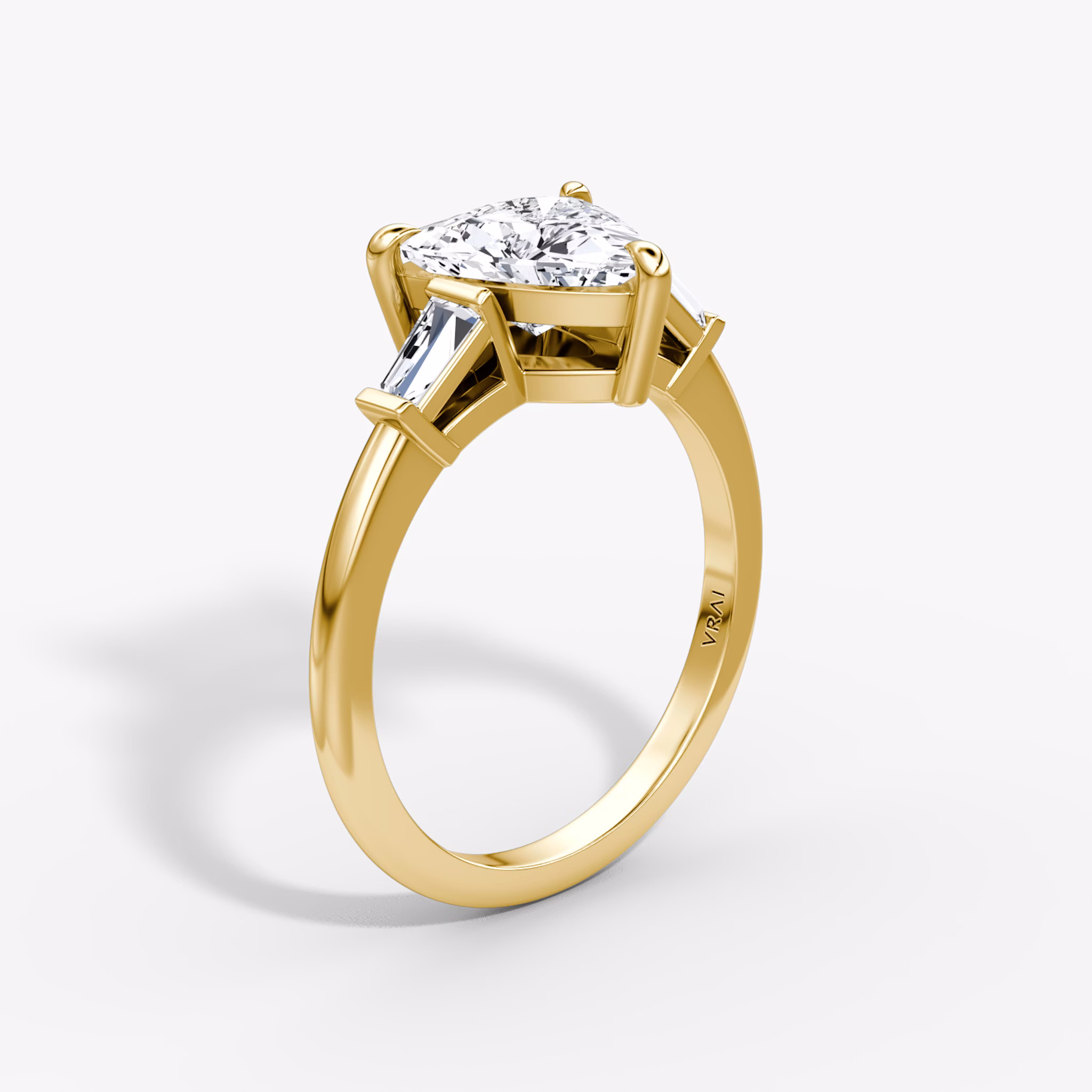 The Tapered Baguette Three Stone | Trillion | 18k | Yellow Gold | bandAccent: Plain | excludeFromFeed: null | diamondOrientation: vertical | caratWeight: other
