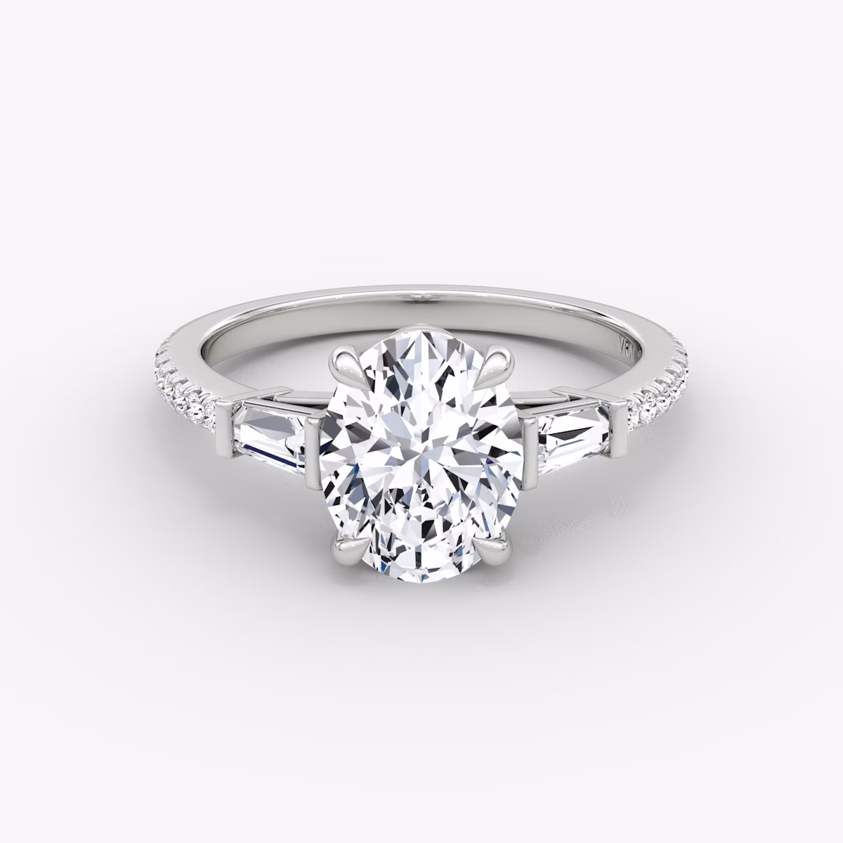 The Tapered Baguette Three Stone | Oval | Platinum | bandAccent: Pavé | caratWeight: 1.0ct | excludeFromFeed: null | diamondOrientation: vertical