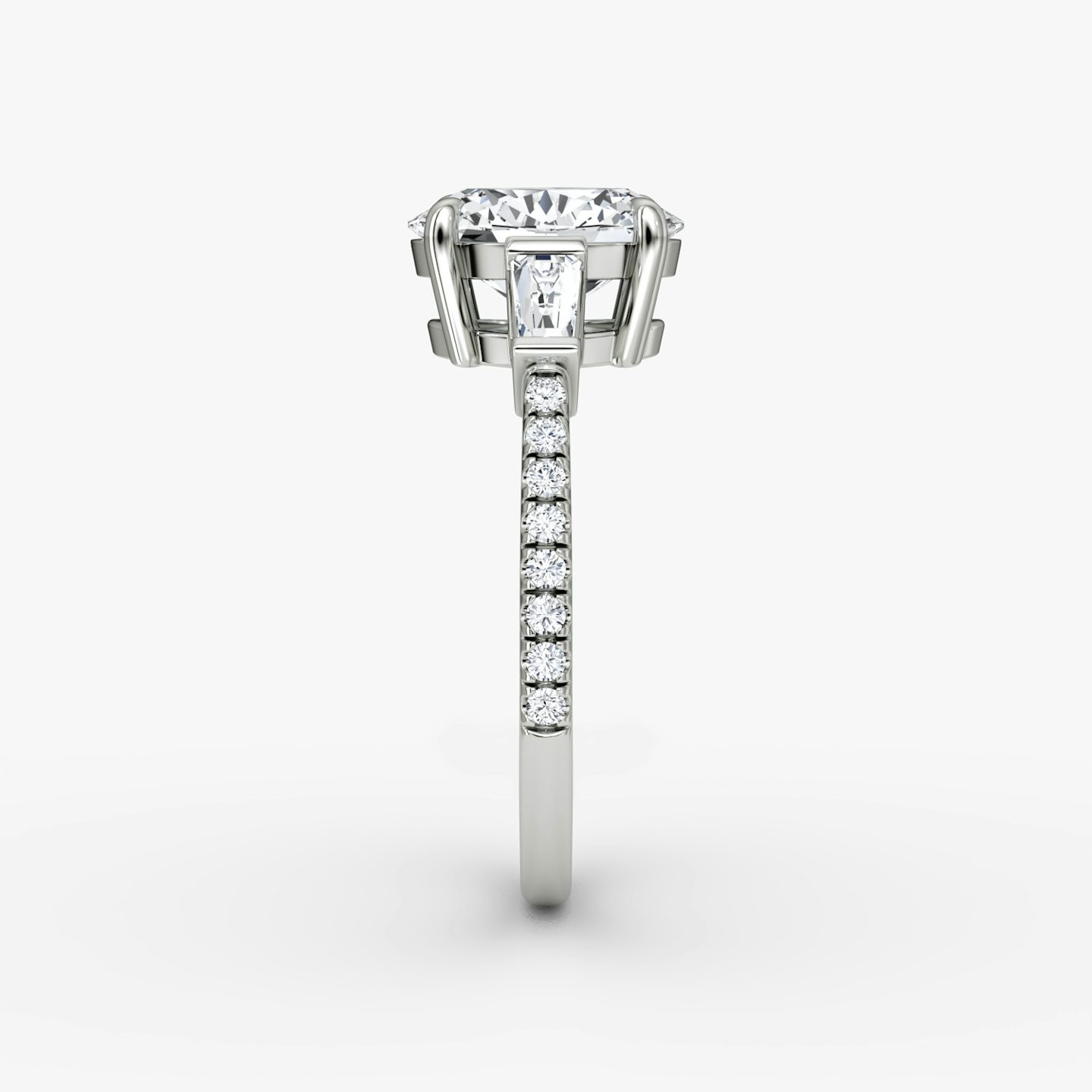 The Tapered Baguette Three Stone | Oval | Platinum | bandAccent: Pavé | excludeFromFeed: null | diamondOrientation: vertical | caratWeight: other