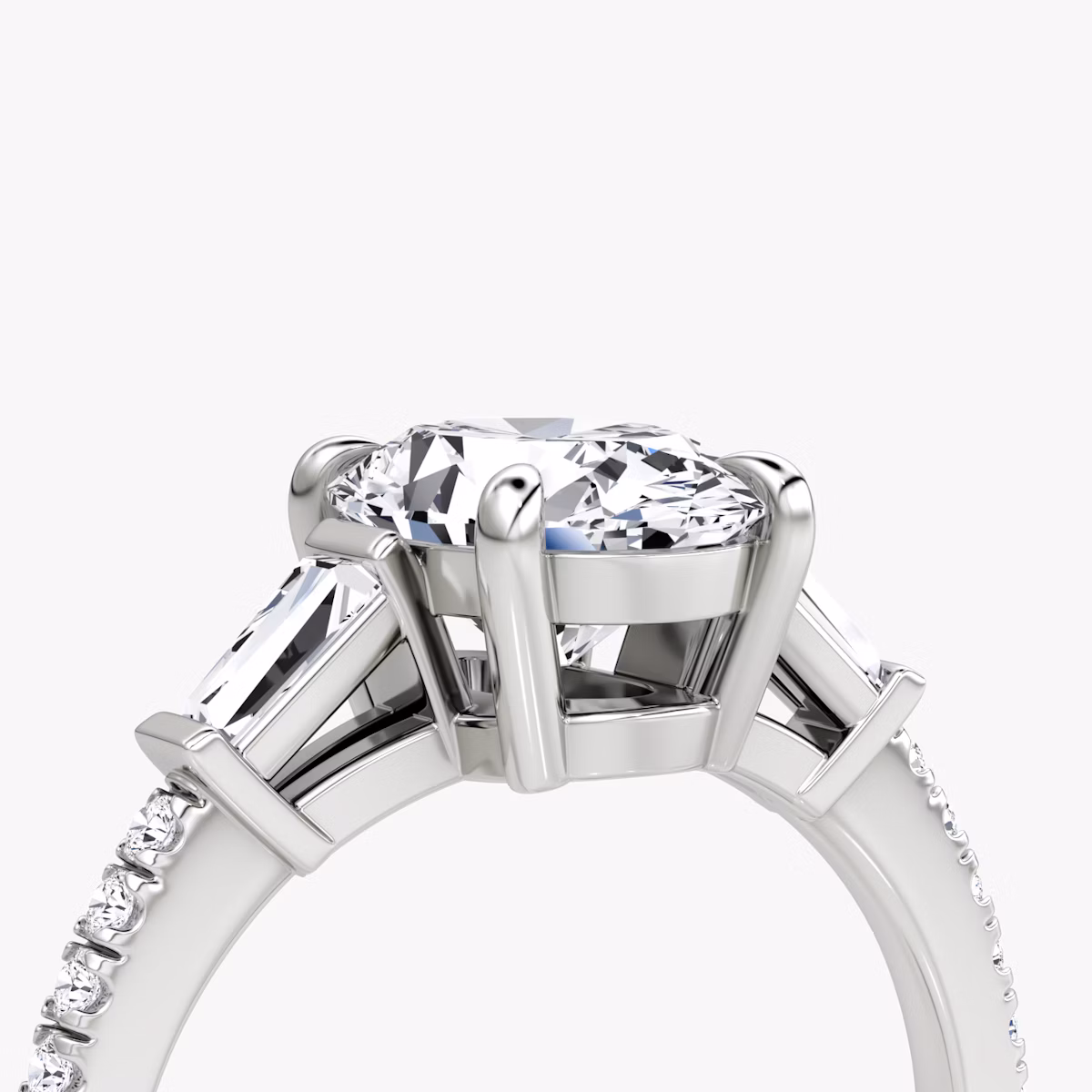 The Tapered Baguette Three Stone | Oval | 18k | White Gold | bandAccent: Pavé | caratWeight: 1.0ct | excludeFromFeed: null | diamondOrientation: vertical