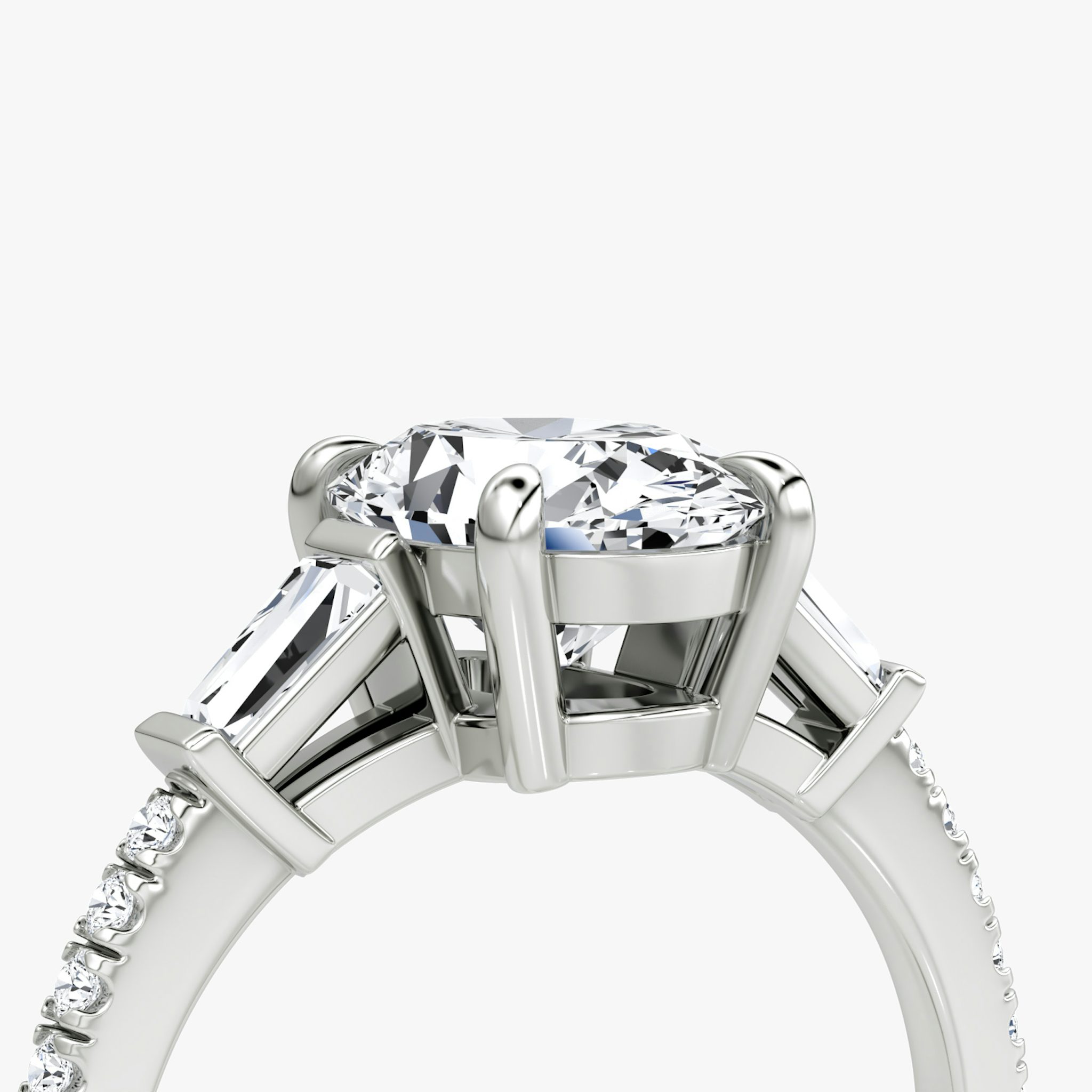 The Tapered Baguette Three Stone | Oval | 18k | White Gold | bandAccent: Pavé | excludeFromFeed: null | diamondOrientation: vertical | caratWeight: other
