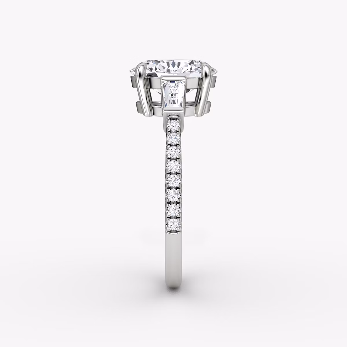 The Tapered Baguette Three Stone | Oval | 18k | White Gold | bandAccent: Pavé | caratWeight: 1.0ct | excludeFromFeed: null | diamondOrientation: vertical