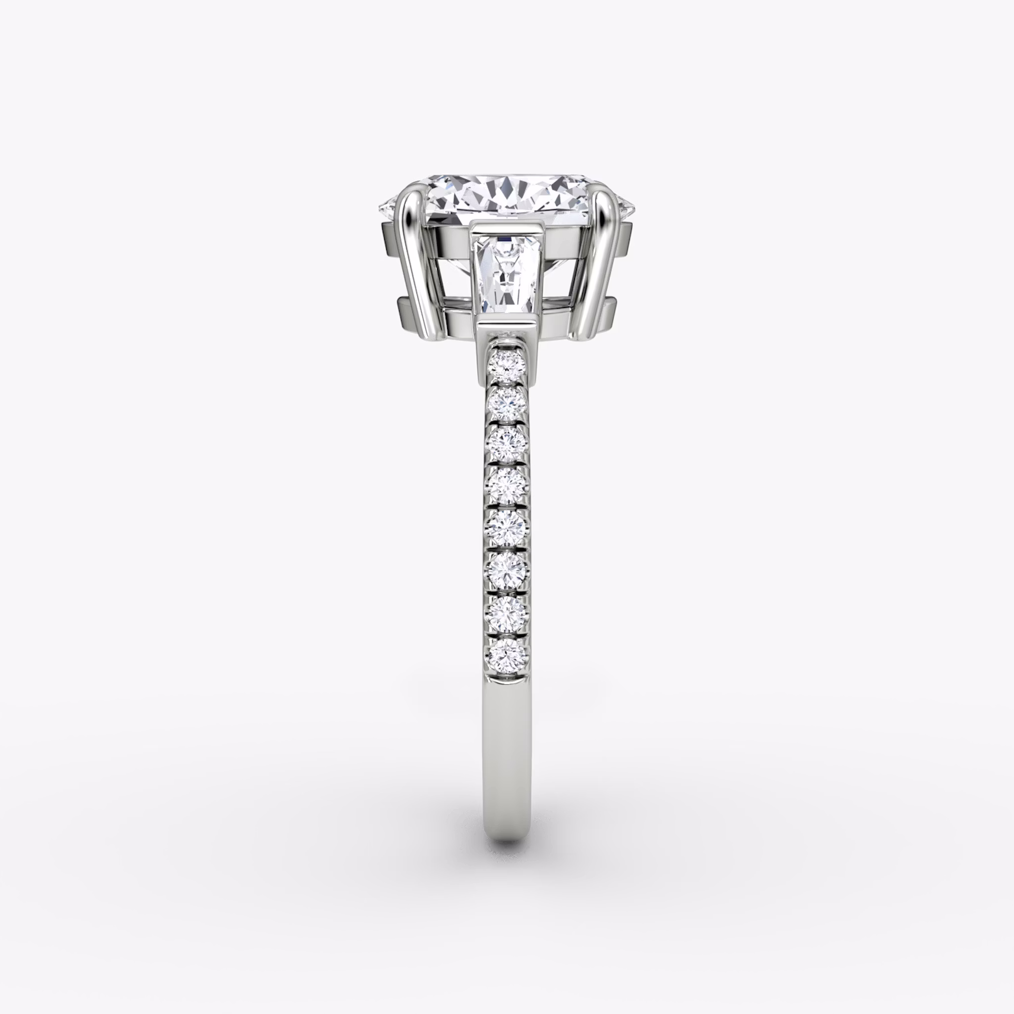 The Tapered Baguette Three Stone | Oval | 18k | White Gold | bandAccent: Pavé | excludeFromFeed: null | diamondOrientation: vertical | caratWeight: other