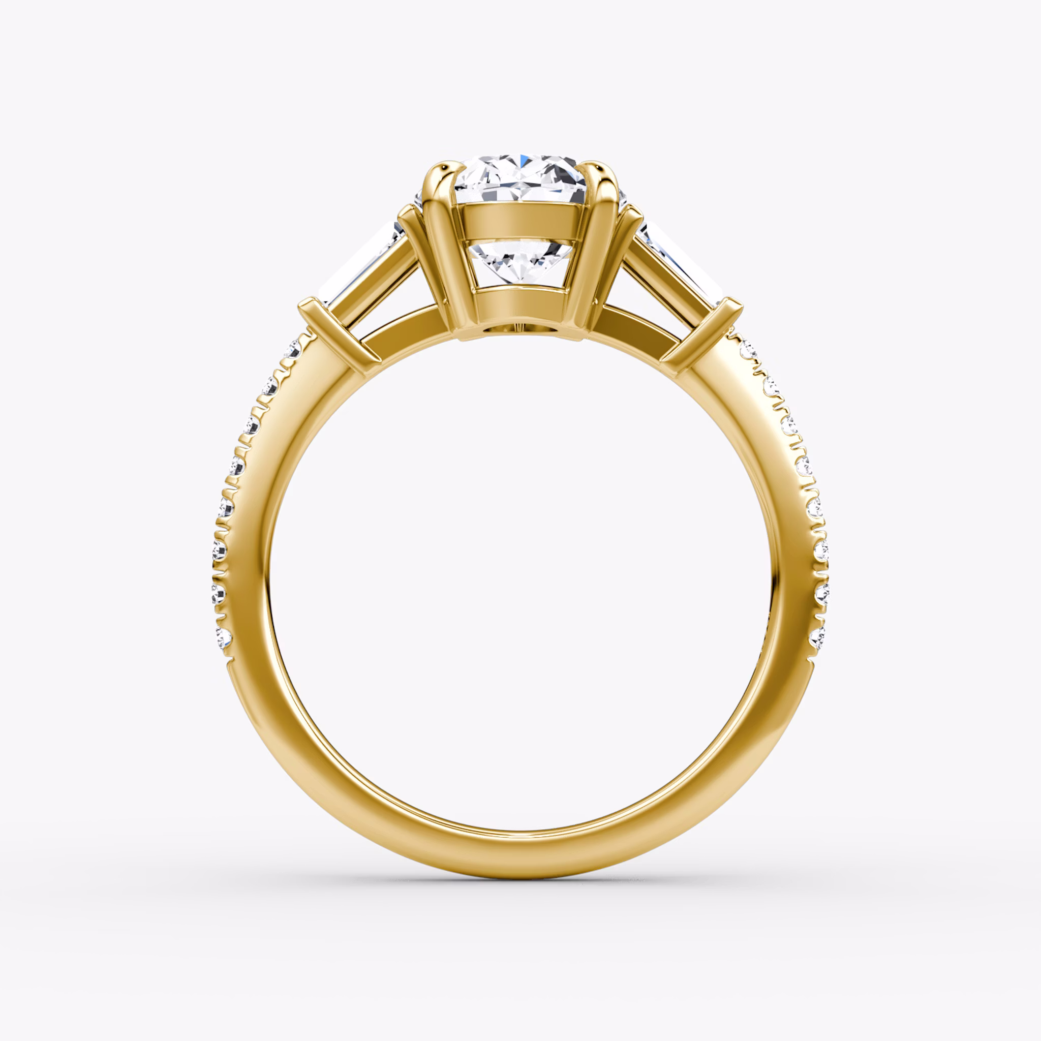 The Tapered Baguette Three Stone | Oval | 18k | Yellow Gold | bandAccent: Pavé | excludeFromFeed: null | diamondOrientation: vertical | caratWeight: other