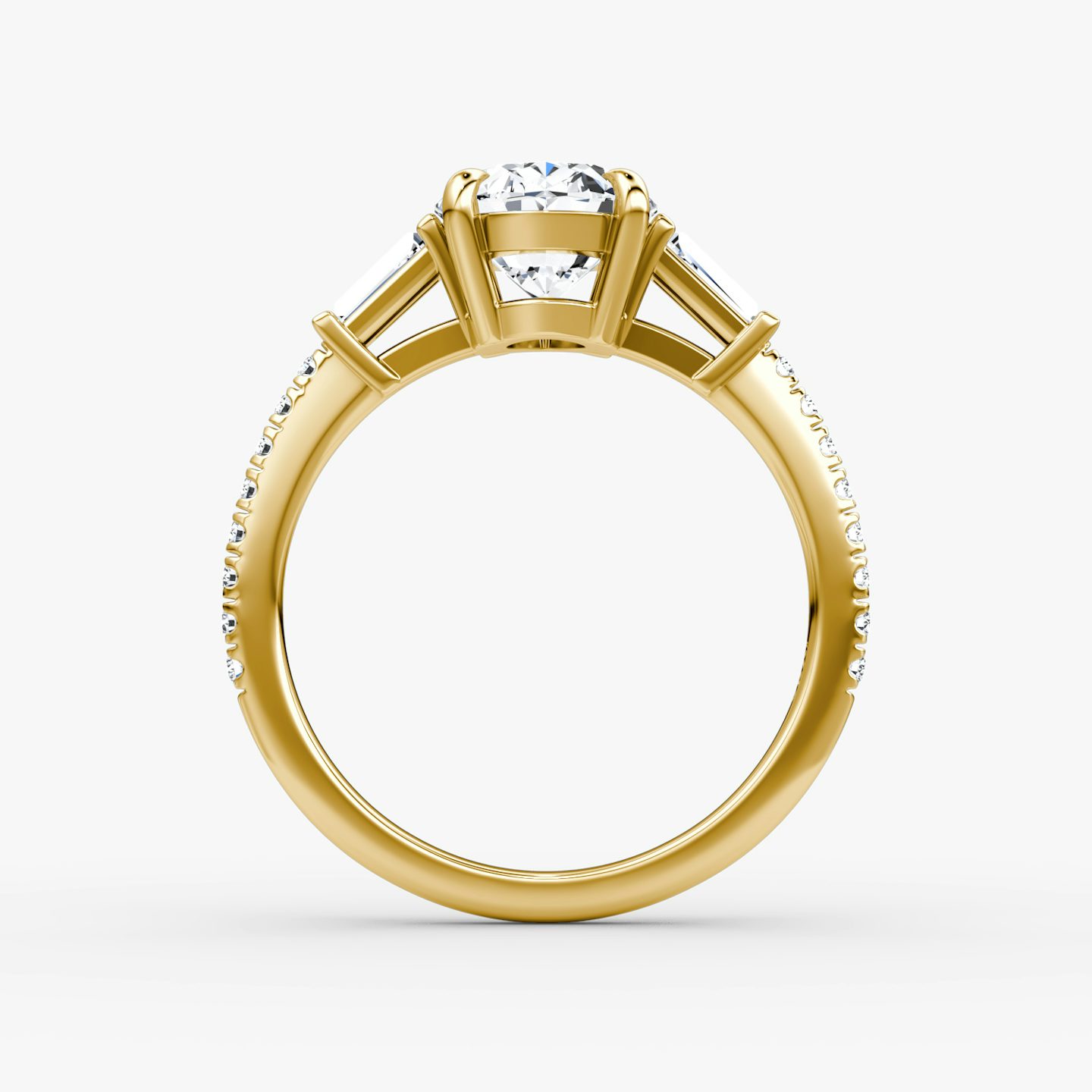 The Tapered Baguette Three Stone | Oval | 18k | Yellow Gold | bandAccent: Pavé | excludeFromFeed: null | diamondOrientation: vertical | caratWeight: other