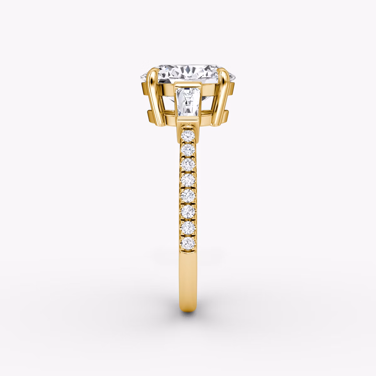 The Tapered Baguette Three Stone | Oval | 18k | Yellow Gold | bandAccent: Pavé | caratWeight: 1.0ct | excludeFromFeed: null | diamondOrientation: vertical