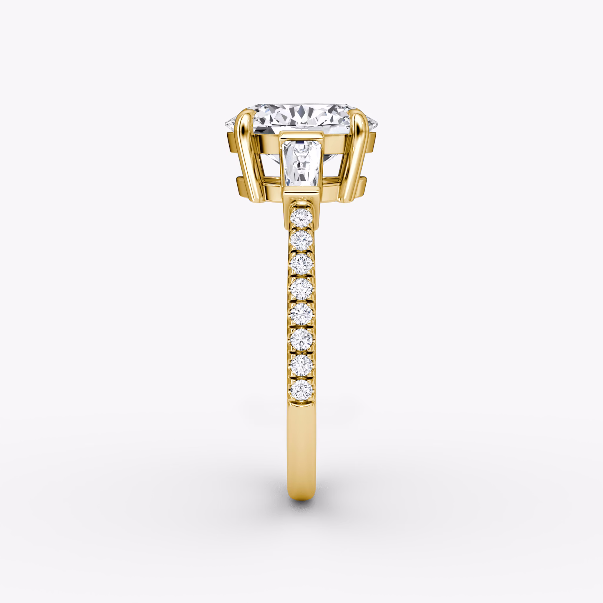 The Tapered Baguette Three Stone | Oval | 18k | Yellow Gold | bandAccent: Pavé | excludeFromFeed: null | diamondOrientation: vertical | caratWeight: other