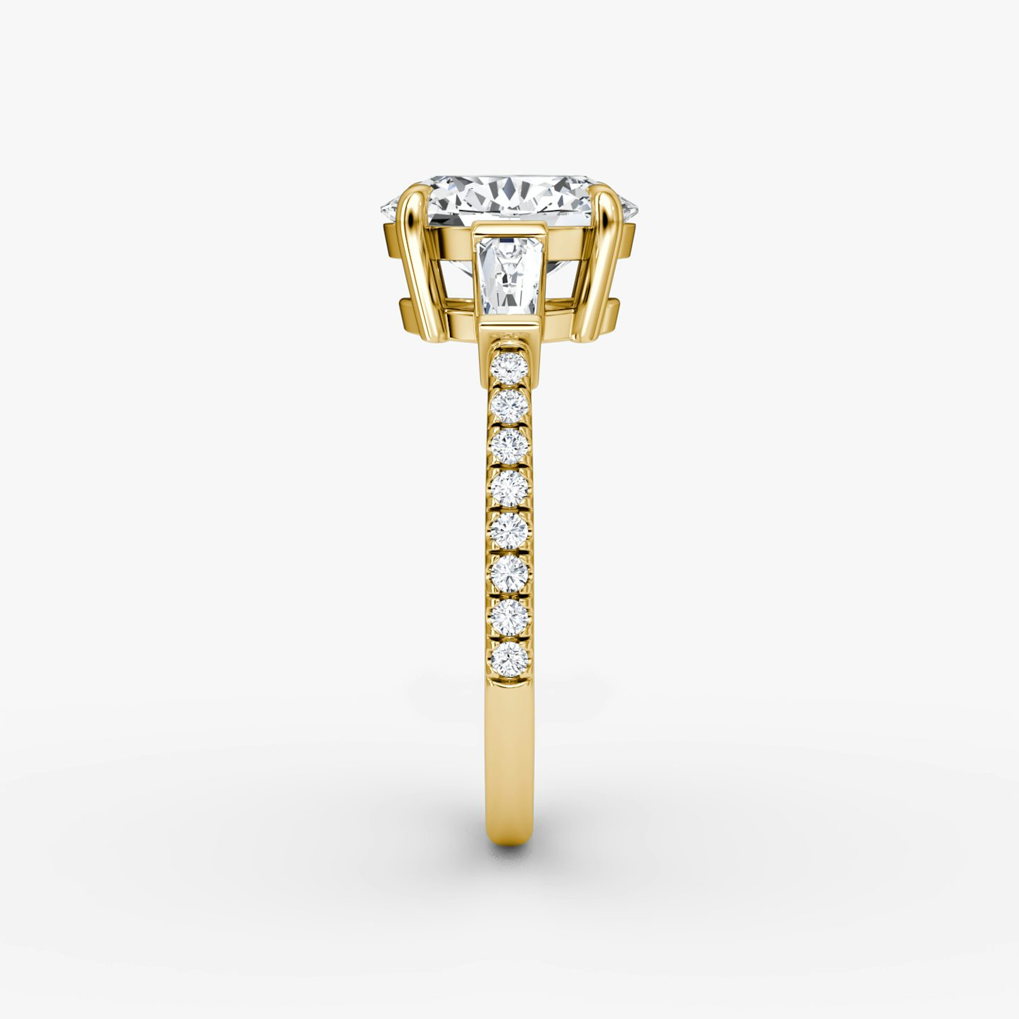 The Tapered Baguette Three Stone | Oval | 18k | Yellow Gold | bandAccent: Pavé | excludeFromFeed: null | diamondOrientation: vertical | caratWeight: other