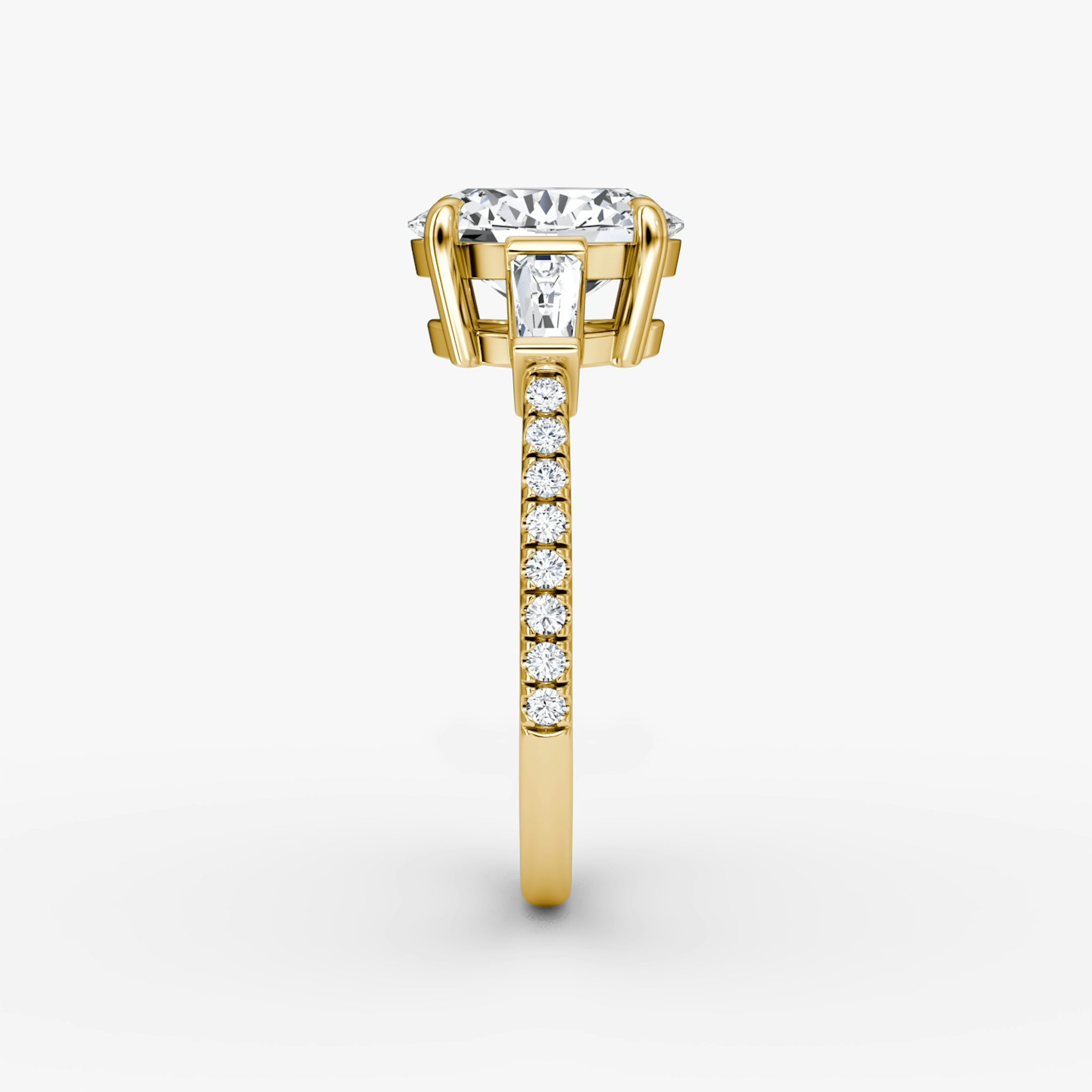 The Tapered Baguette Three Stone | Oval | 18k | Yellow Gold | bandAccent: Pavé | excludeFromFeed: null | diamondOrientation: vertical | caratWeight: other