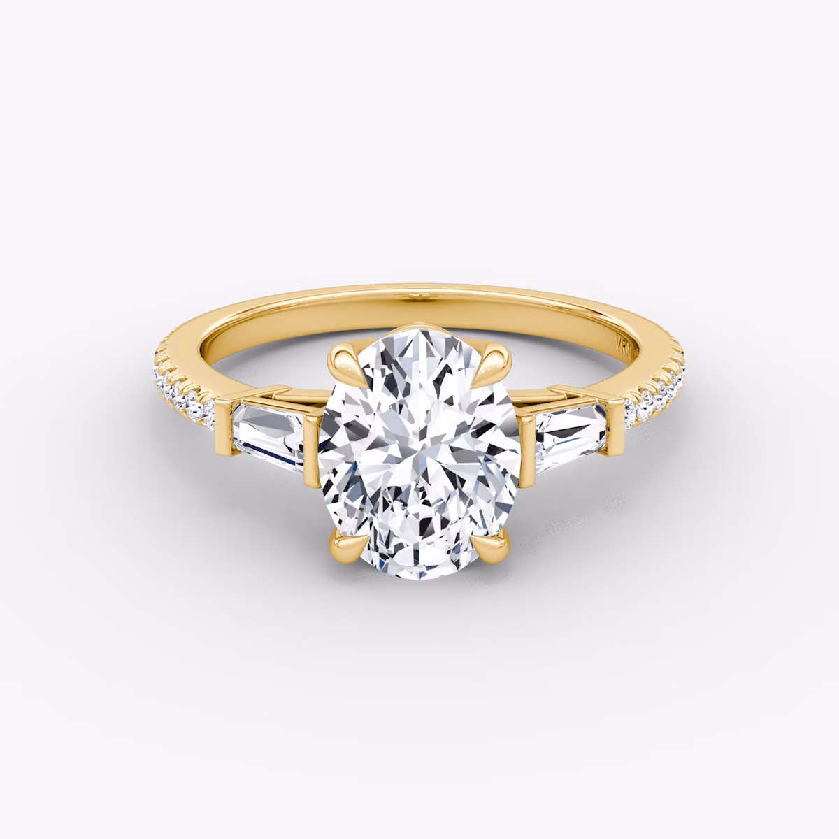 The Tapered Baguette Three Stone | Oval | 18k | Yellow Gold | bandAccent: Pavé | caratWeight: 1.0ct | excludeFromFeed: null | diamondOrientation: vertical