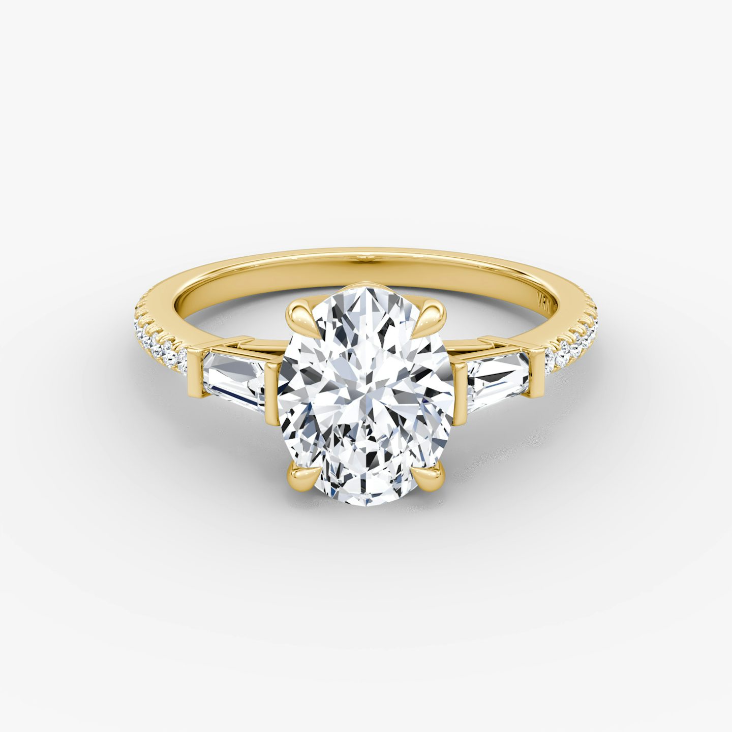 The Tapered Baguette Three Stone | Oval | 18k | Yellow Gold | bandAccent: Pavé | excludeFromFeed: null | diamondOrientation: vertical | caratWeight: other