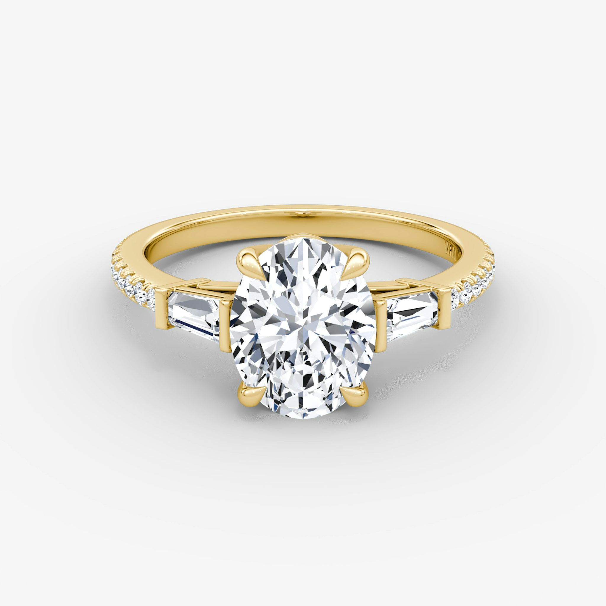 The Tapered Baguette Three Stone | Oval | 18k | Yellow Gold | bandAccent: Pavé | excludeFromFeed: null | diamondOrientation: vertical | caratWeight: other