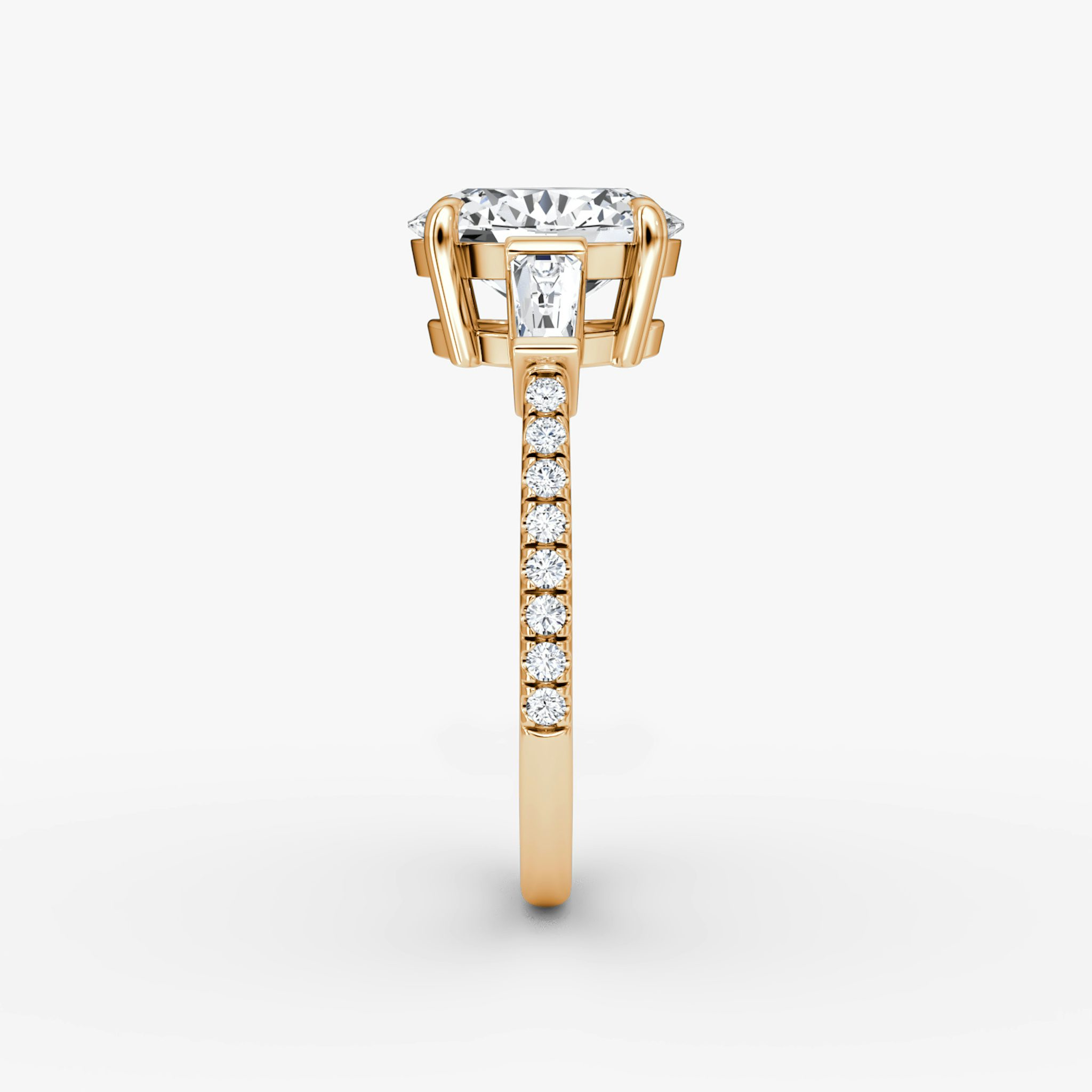 The Tapered Baguette Three Stone | Oval | 14k | Rose Gold | bandAccent: Pavé | excludeFromFeed: null | diamondOrientation: vertical | caratWeight: other