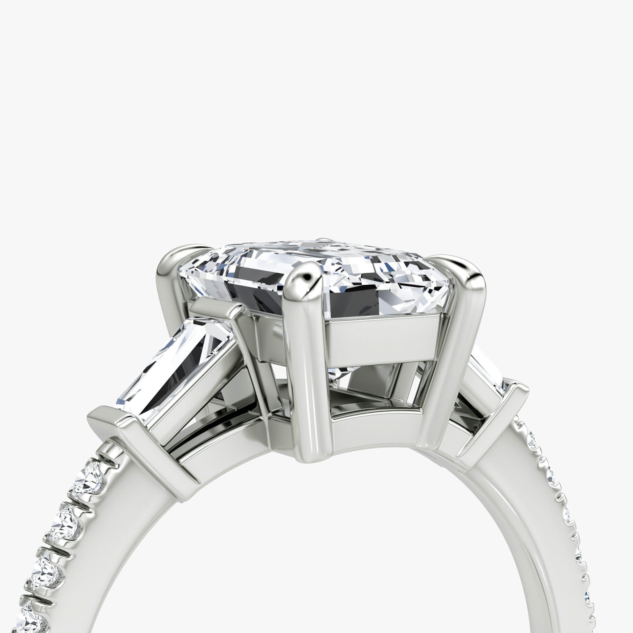 The Tapered Baguette Three Stone | Emerald | Platinum | bandAccent: Pavé | excludeFromFeed: null | diamondOrientation: vertical | caratWeight: other