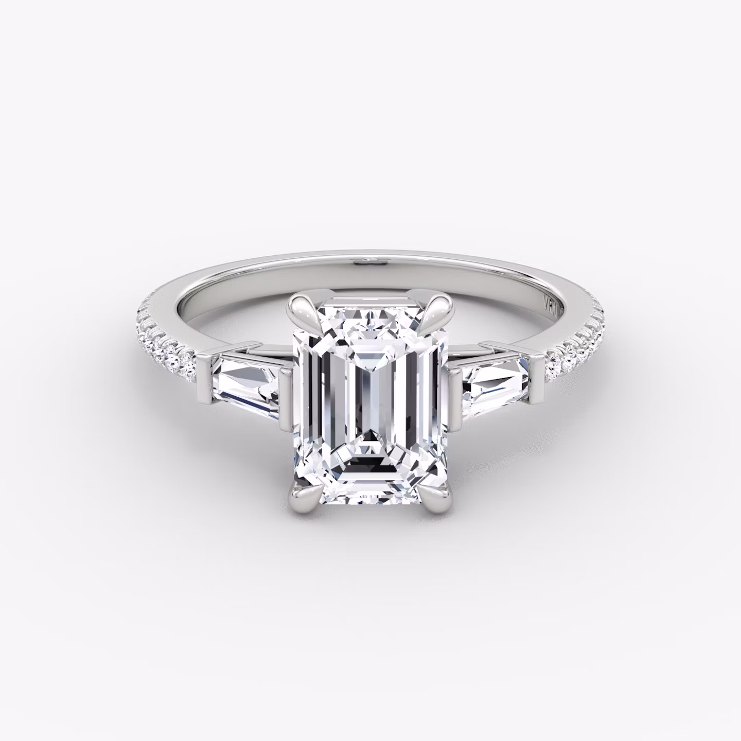 The Tapered Baguette Three Stone | Emerald | Platinum | bandAccent: Pavé | excludeFromFeed: null | diamondOrientation: vertical | caratWeight: other