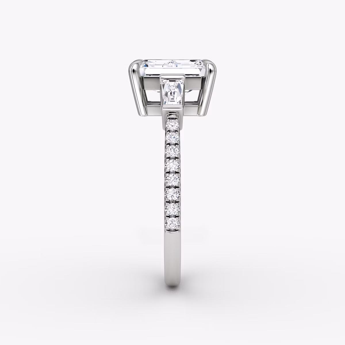 The Tapered Baguette Three Stone | Emerald | Platinum | bandAccent: Pavé | caratWeight: 1.0ct | excludeFromFeed: null | diamondOrientation: vertical